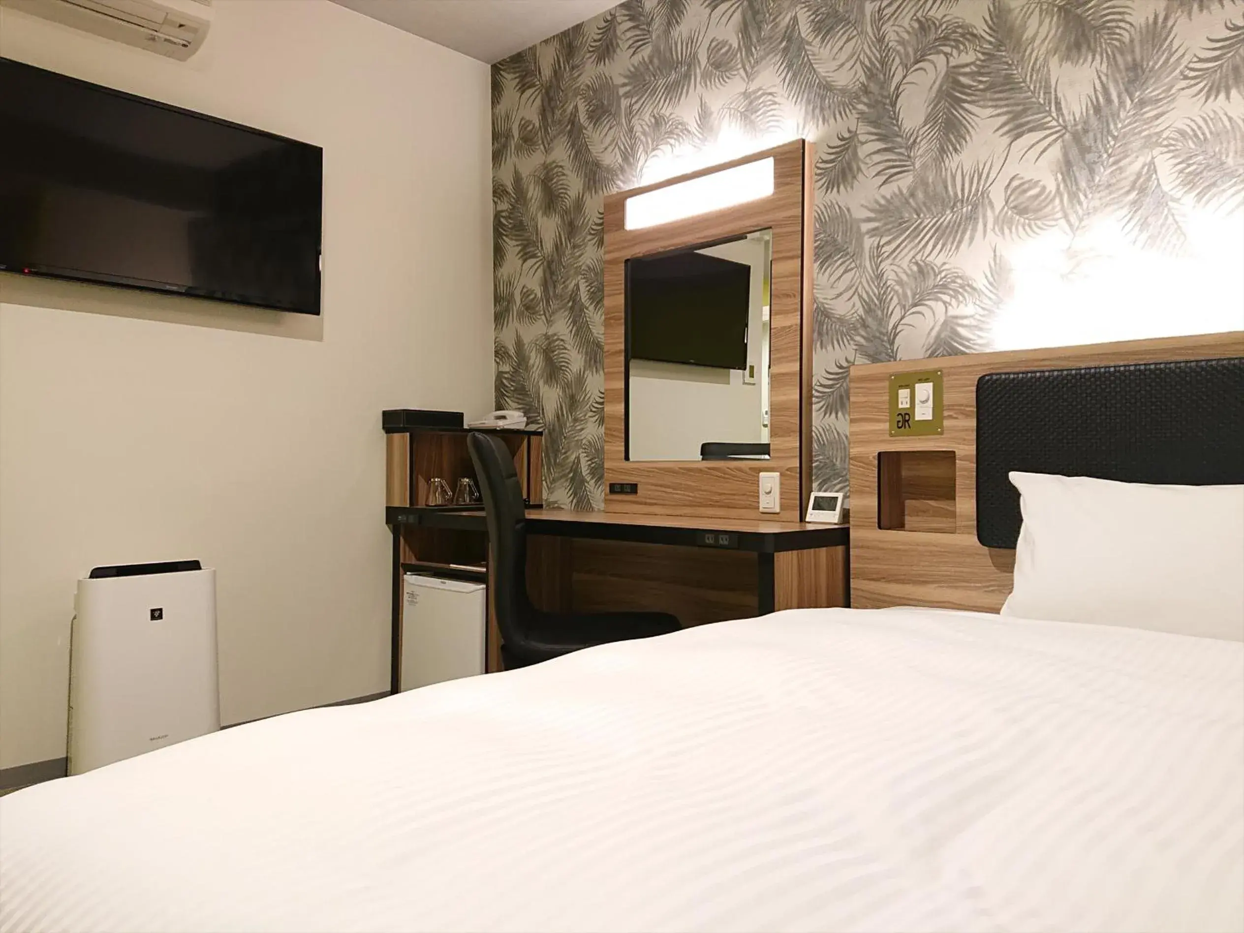 Bed in Green Rich Hotel Okinawa Nago (Artificial hot spring Futamata Yunohana) Bed in Green Rich Hotel Okinawa Nago (Artificial hot spring Futamata Yunohana)