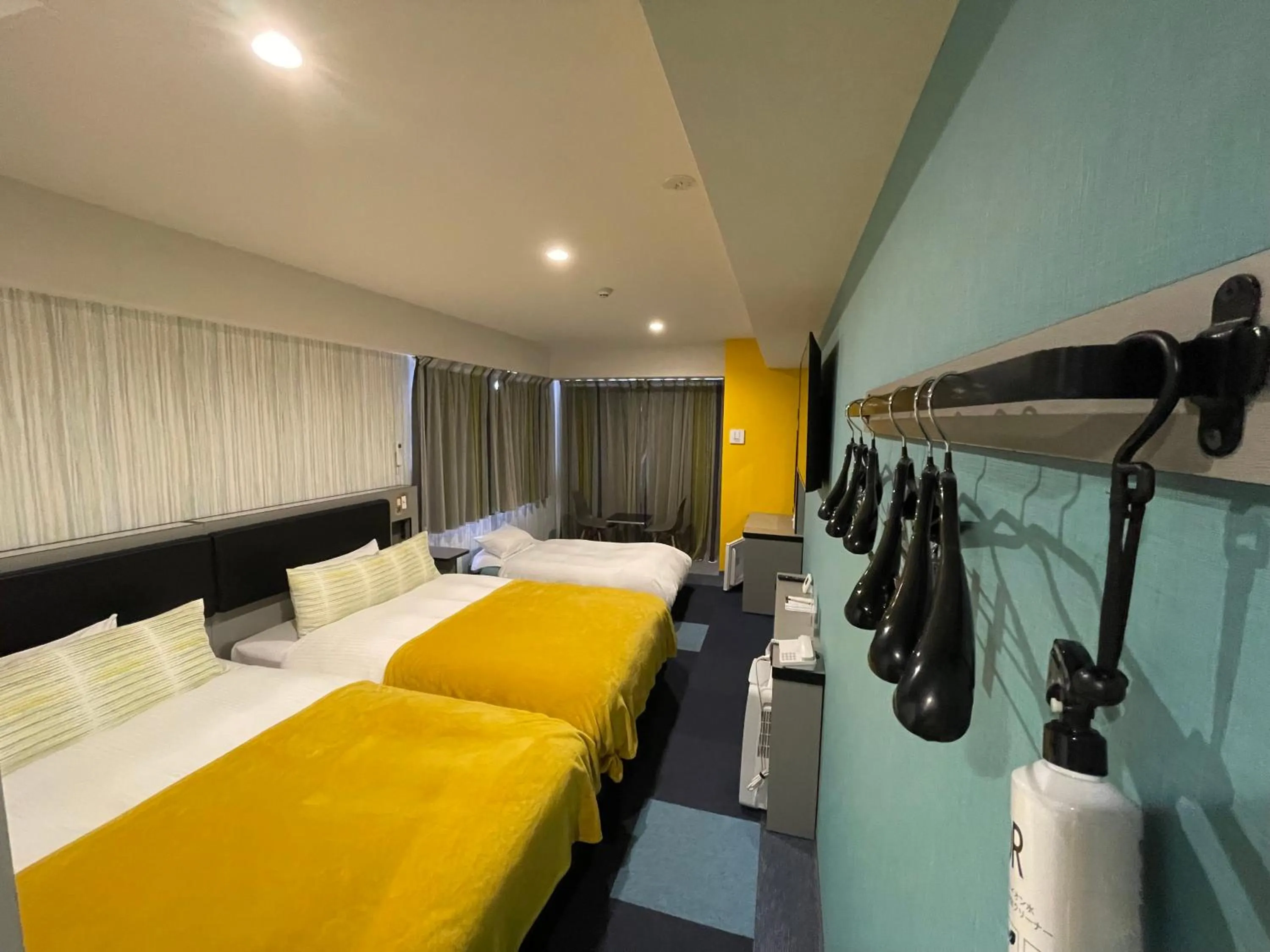 Bed in Green Rich Hotel Okinawa Nago (Artificial hot spring Futamata Yunohana)