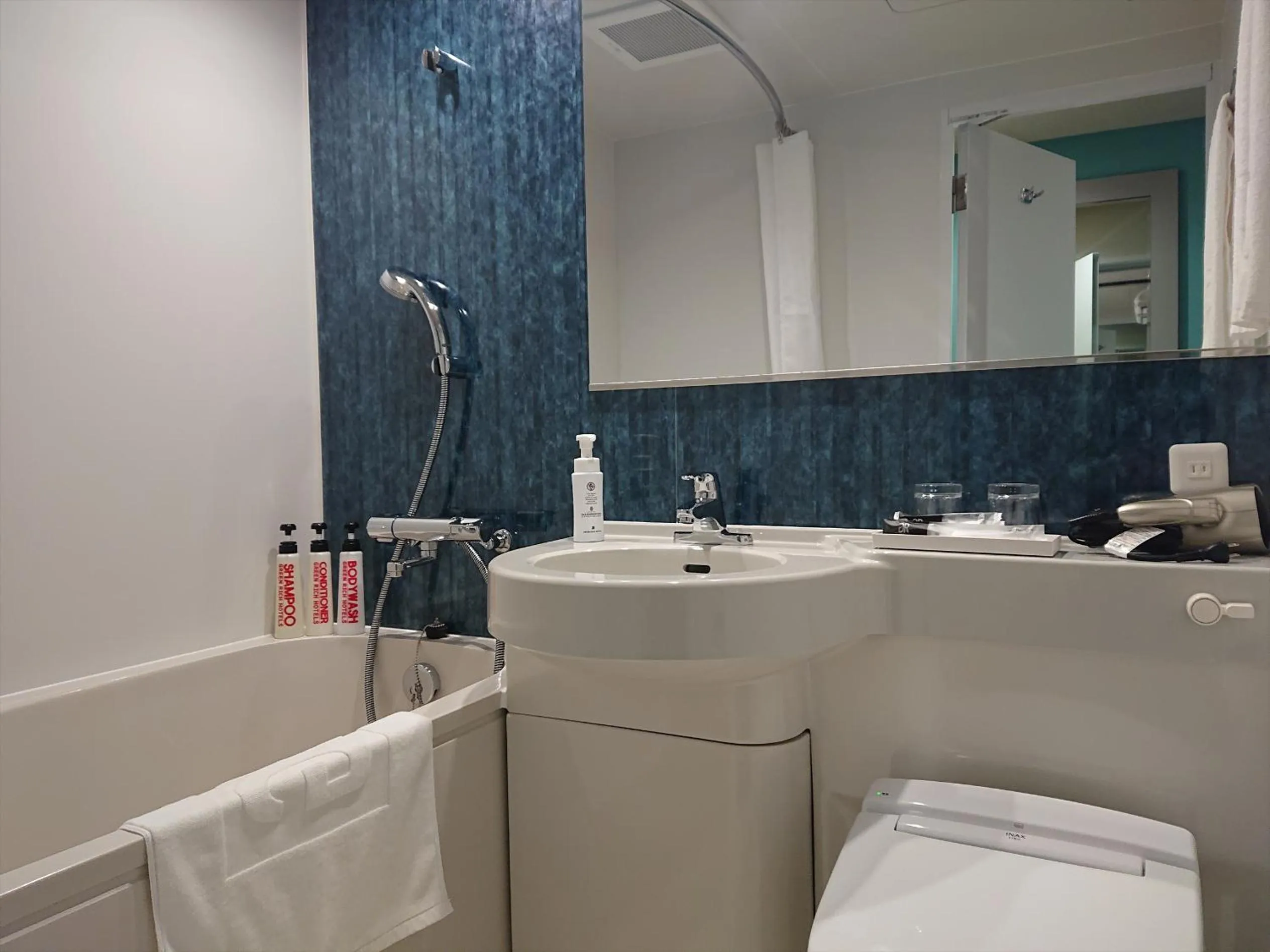 Bathroom in Green Rich Hotel Okinawa Nago (Artificial hot spring Futamata Yunohana)