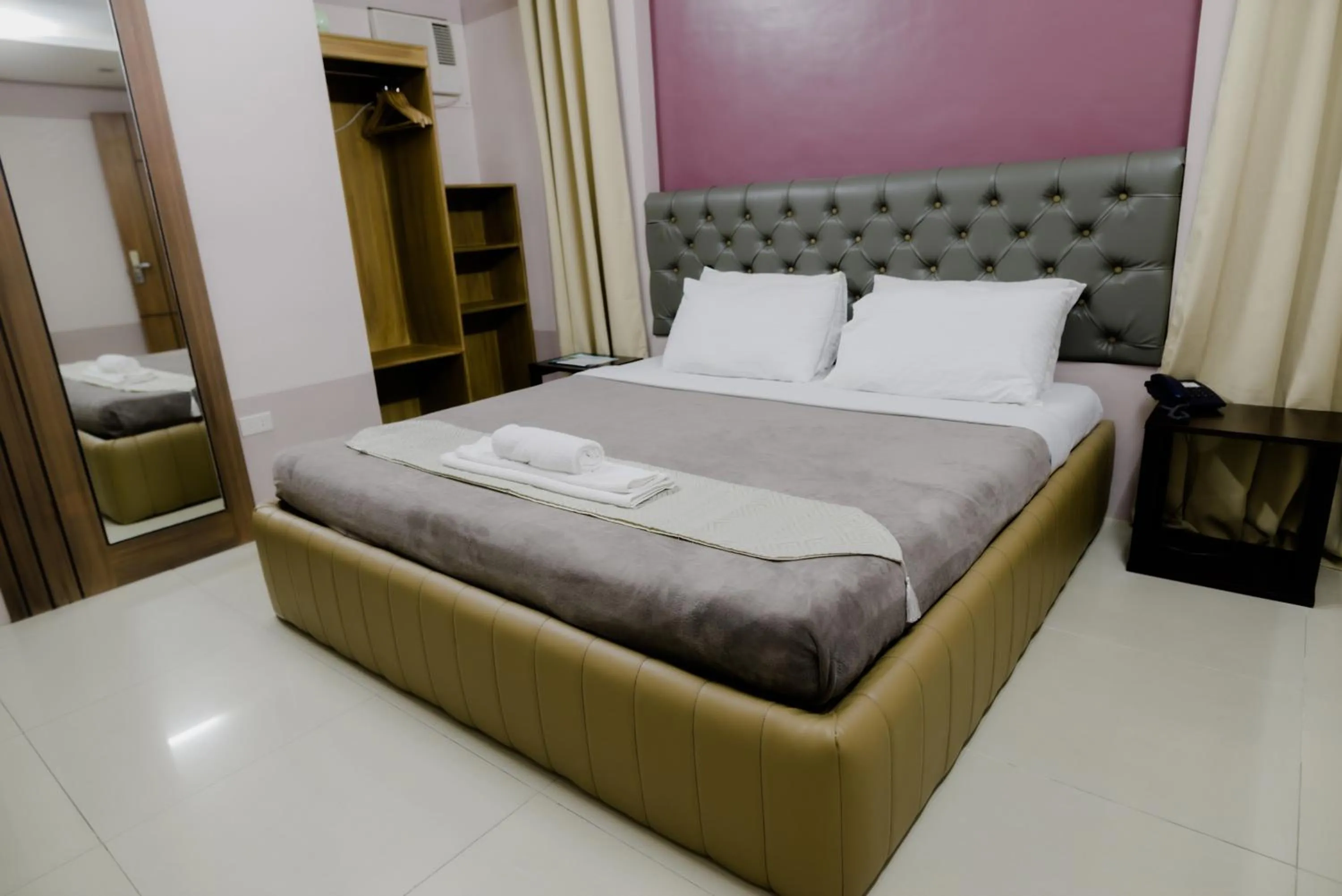 Bed in The Horizon Suites and Arcade