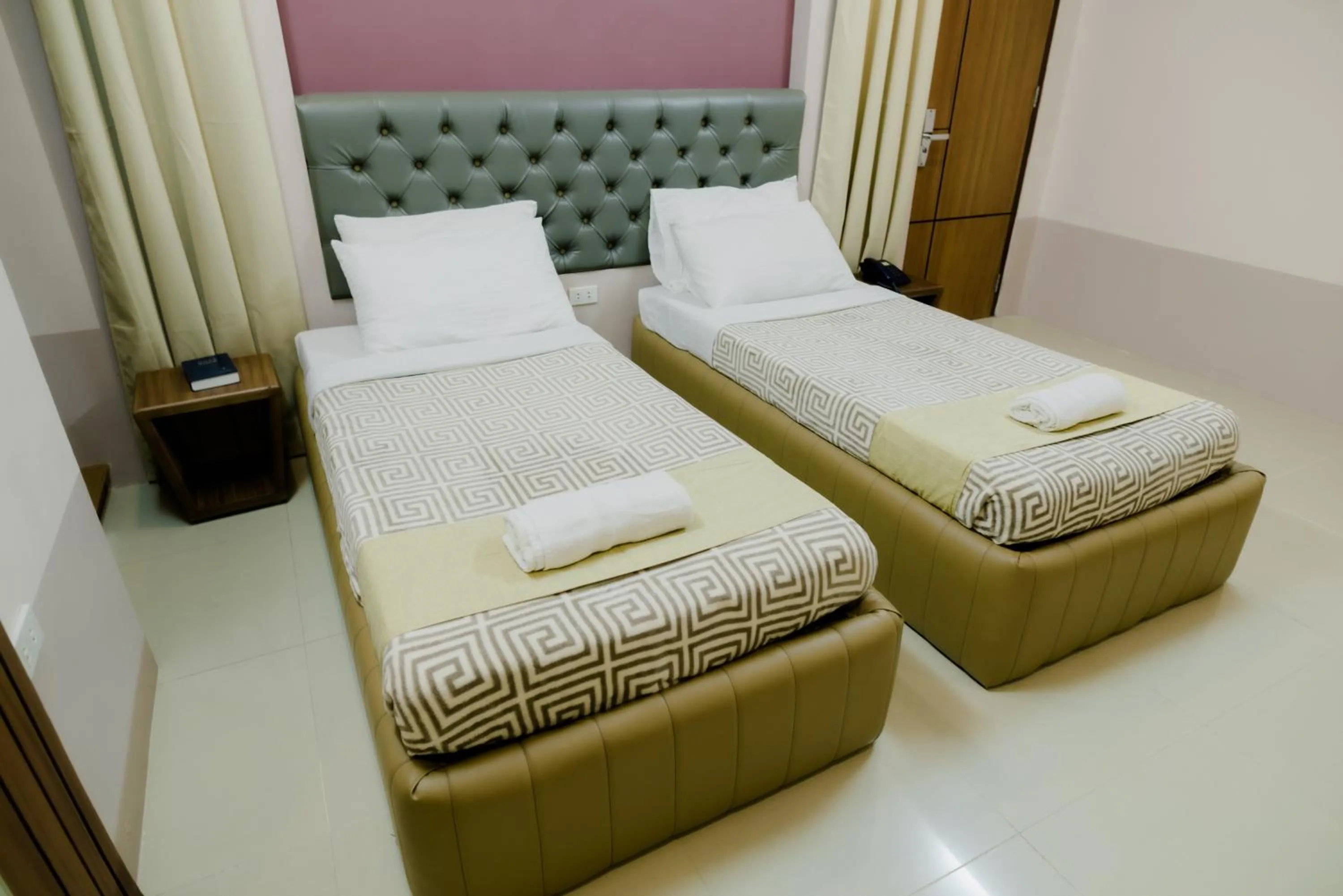 Bed in The Horizon Suites and Arcade