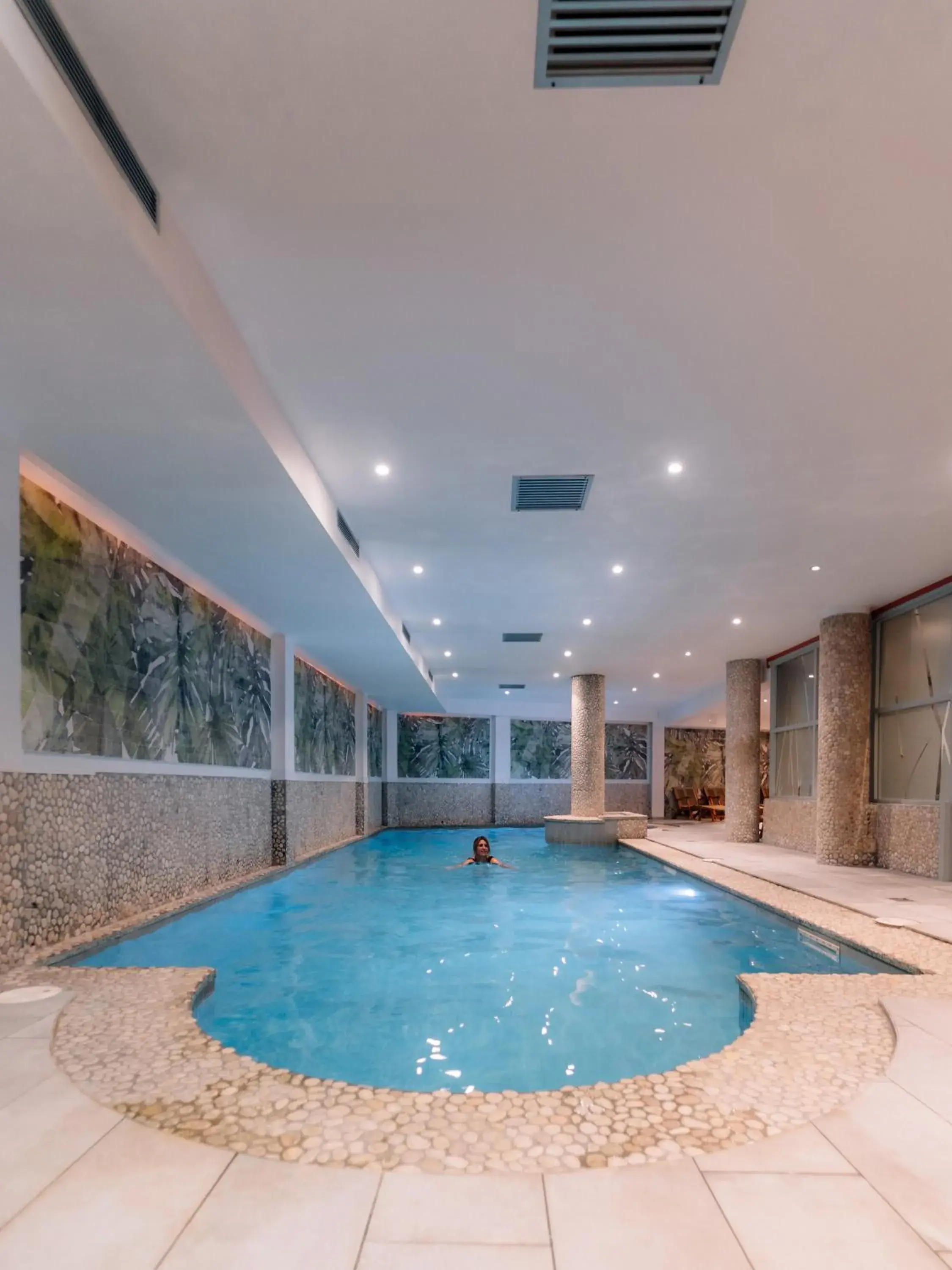 Swimming pool in Urban Hotel & Spa Aix-les-Bains - BW Signature Collection Swimming pool in Urban Hotel & Spa Aix-les-Bains - BW Signature Collection