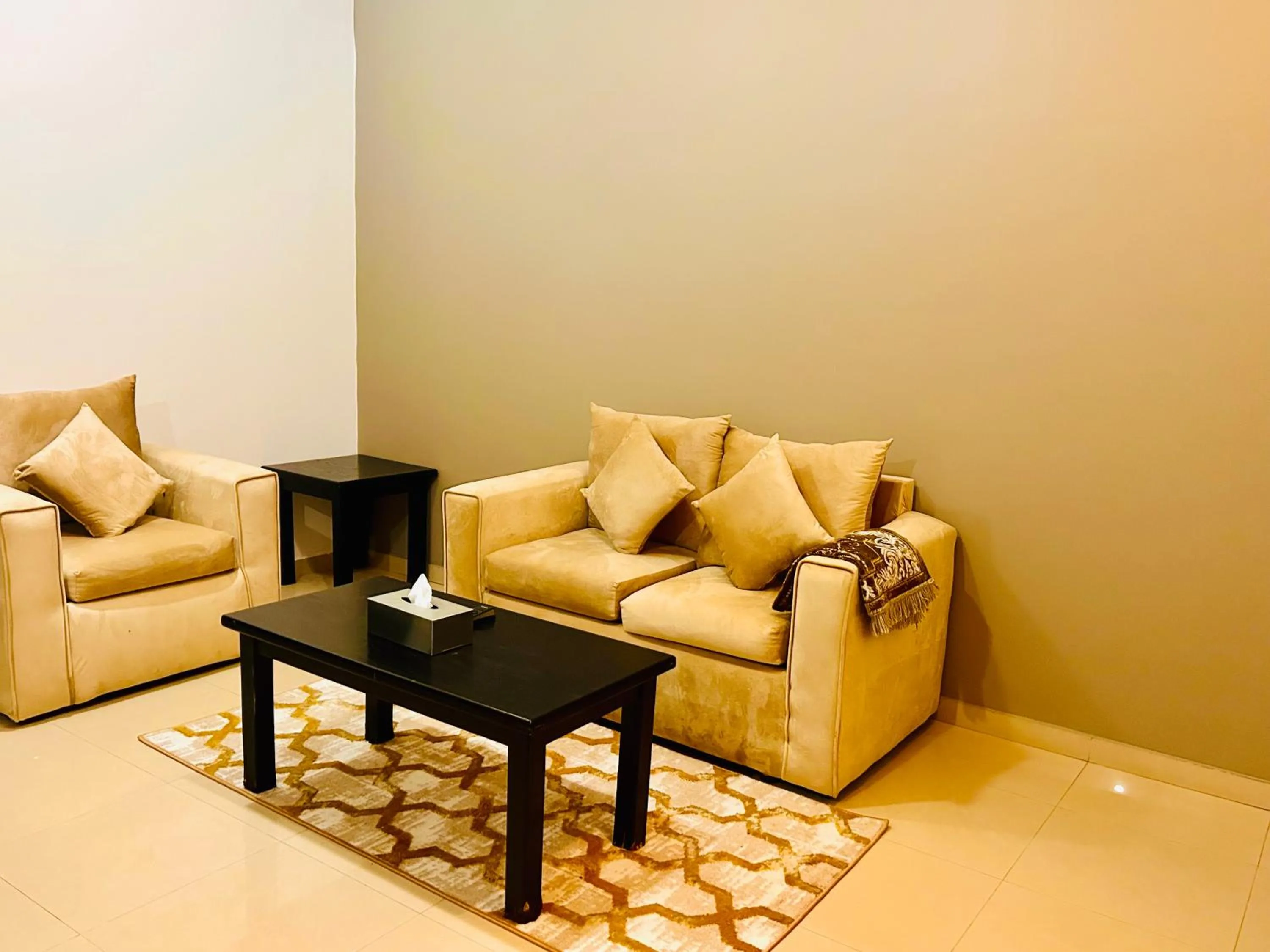 Living room in Arabian Palm Hotel