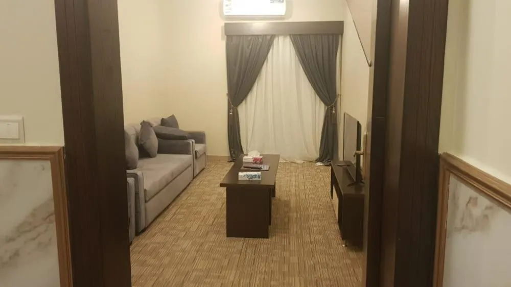 Living room in Arabian Palm Hotel