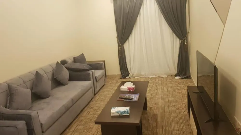 Living room in Arabian Palm Hotel