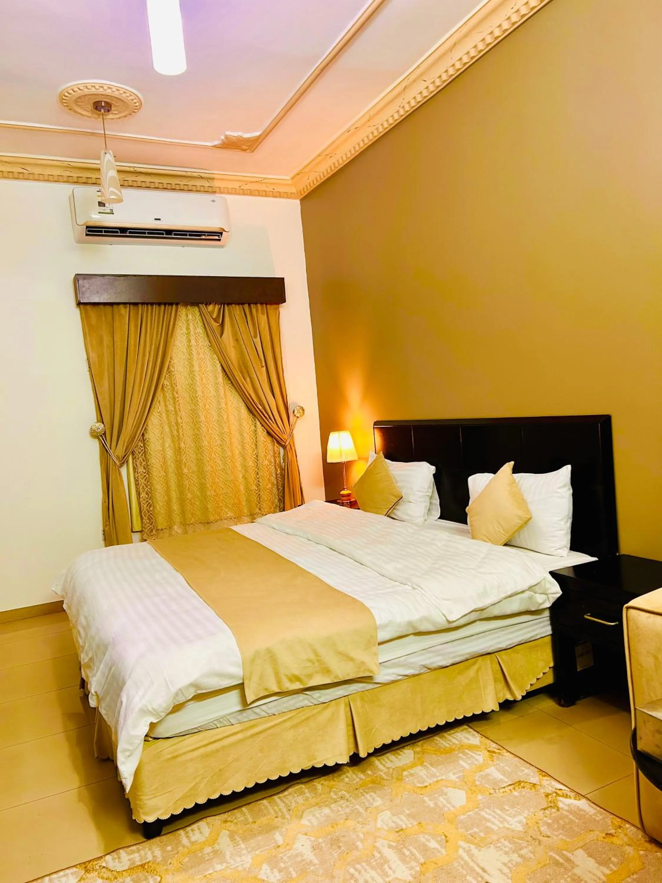 Bed in Arabian Palm Hotel