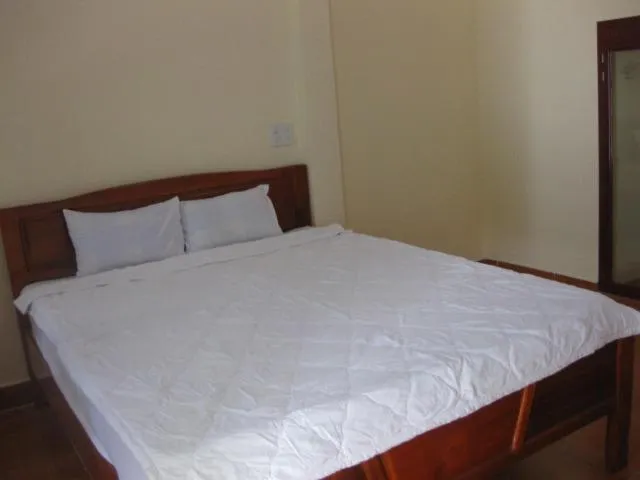 Bed in Cocosand Hotel