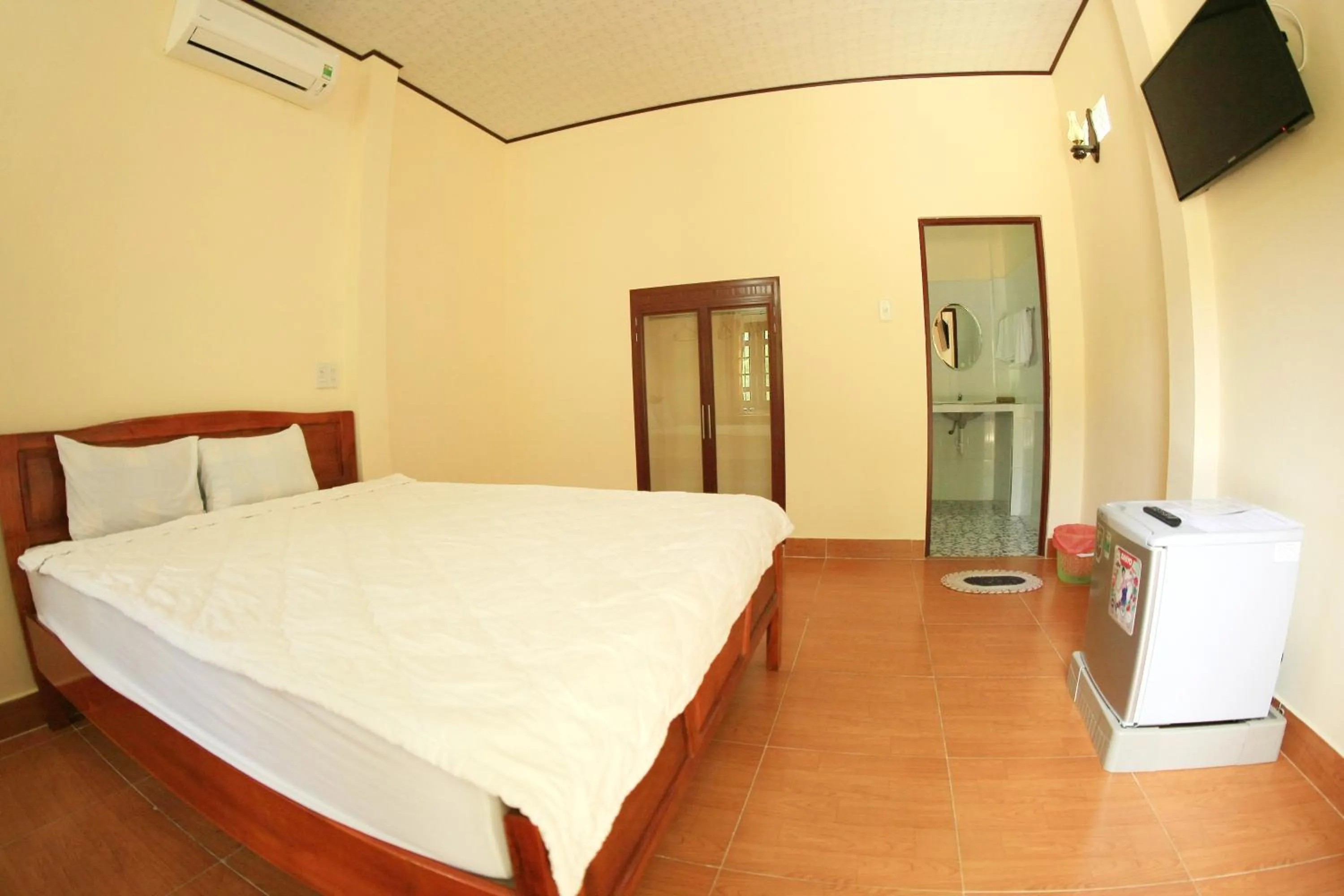 Bed in Cocosand Hotel