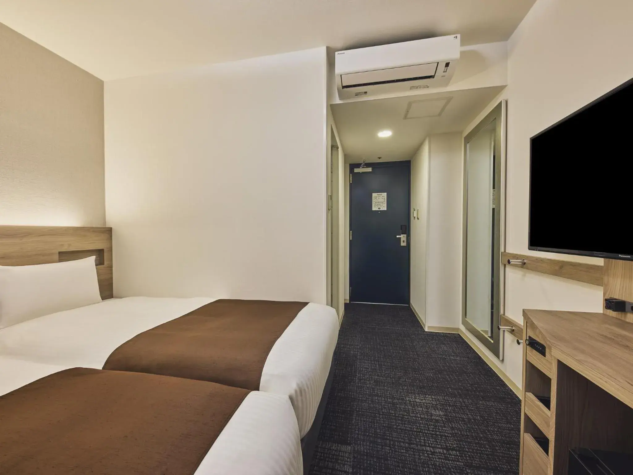 Bed in Villa Fontaine Tokyo Nihombashi Hakozaki Bed in Villa Fontaine Tokyo Nihombashi Hakozaki