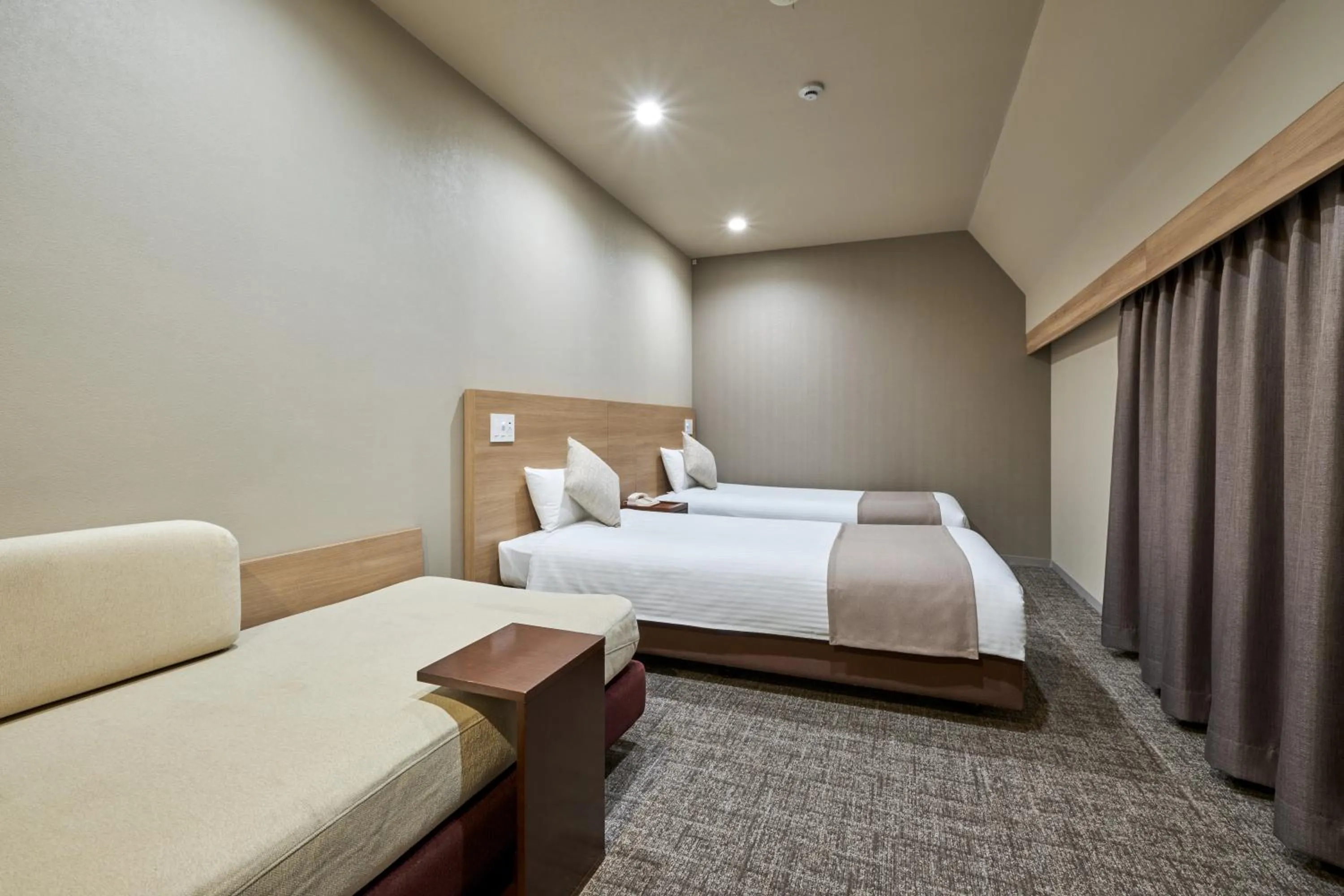 Bed in Hotel Villa Fontaine Tokyo-Jimbocho