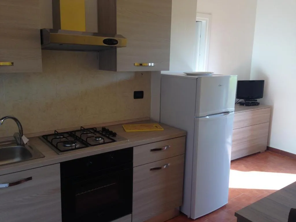 Kitchen or kitchenette in Sardinia Beach Apartments