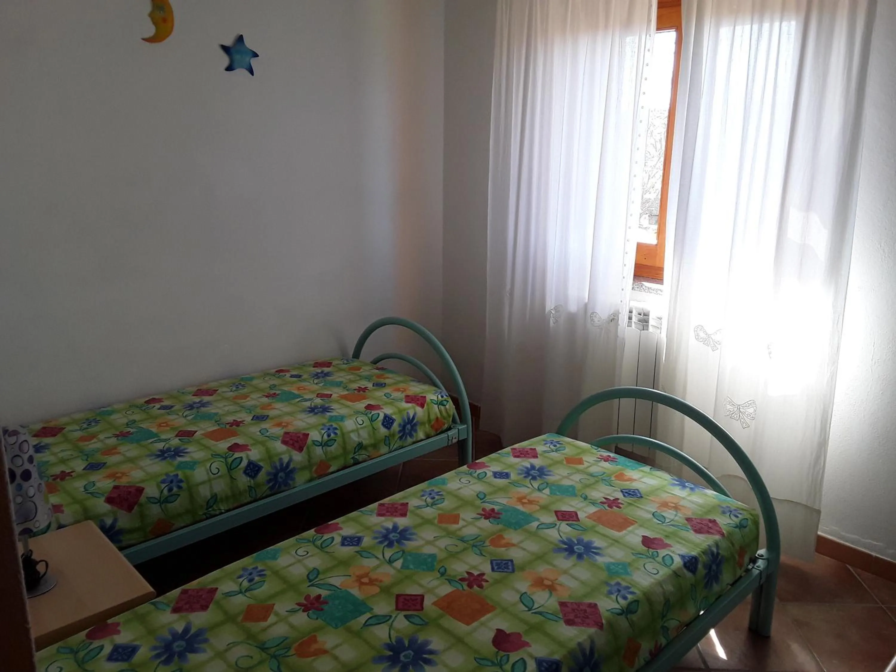 Bed in Sardinia Beach Apartments