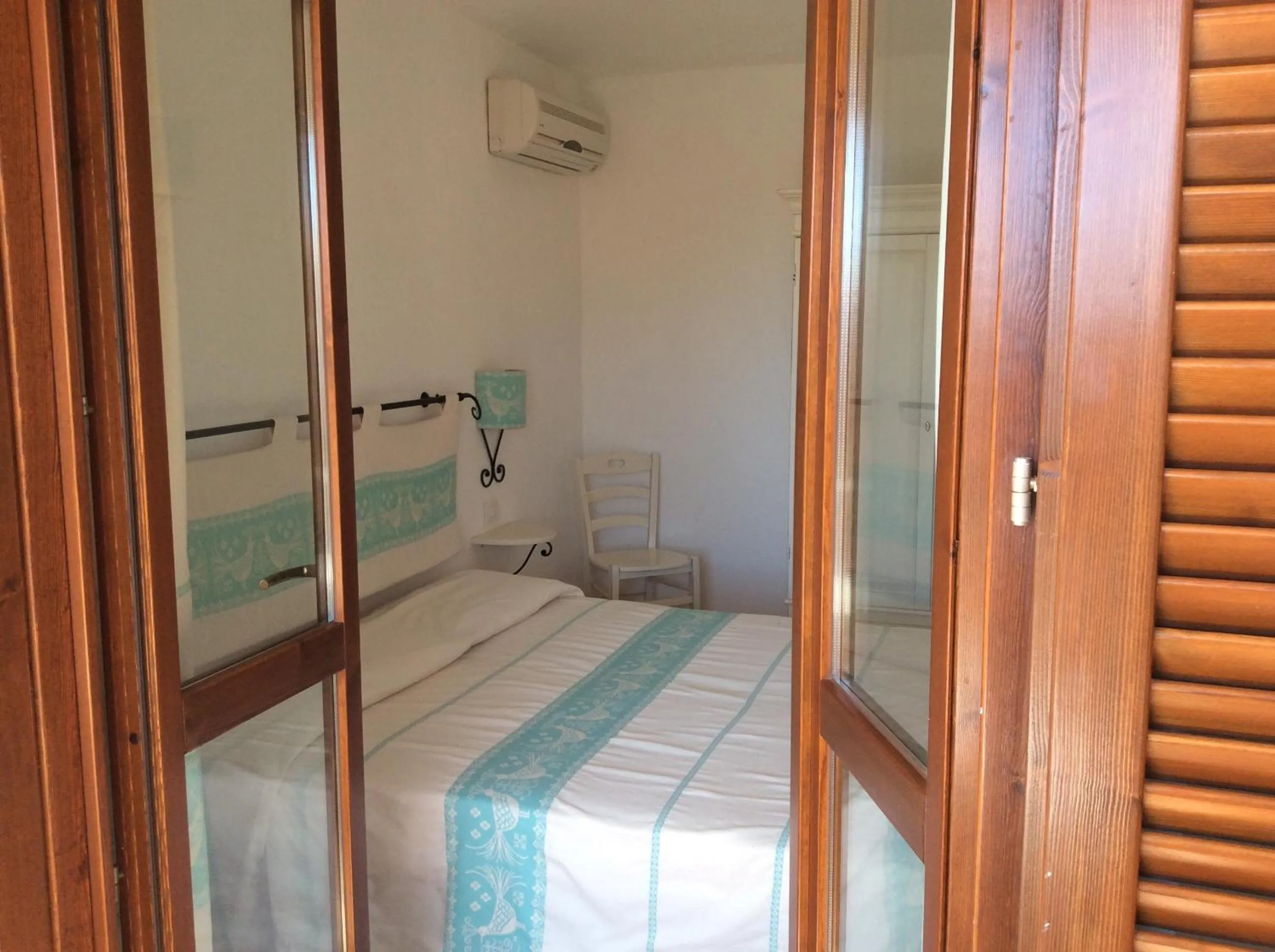 Bedroom, Bed in Sardinia Beach Apartments