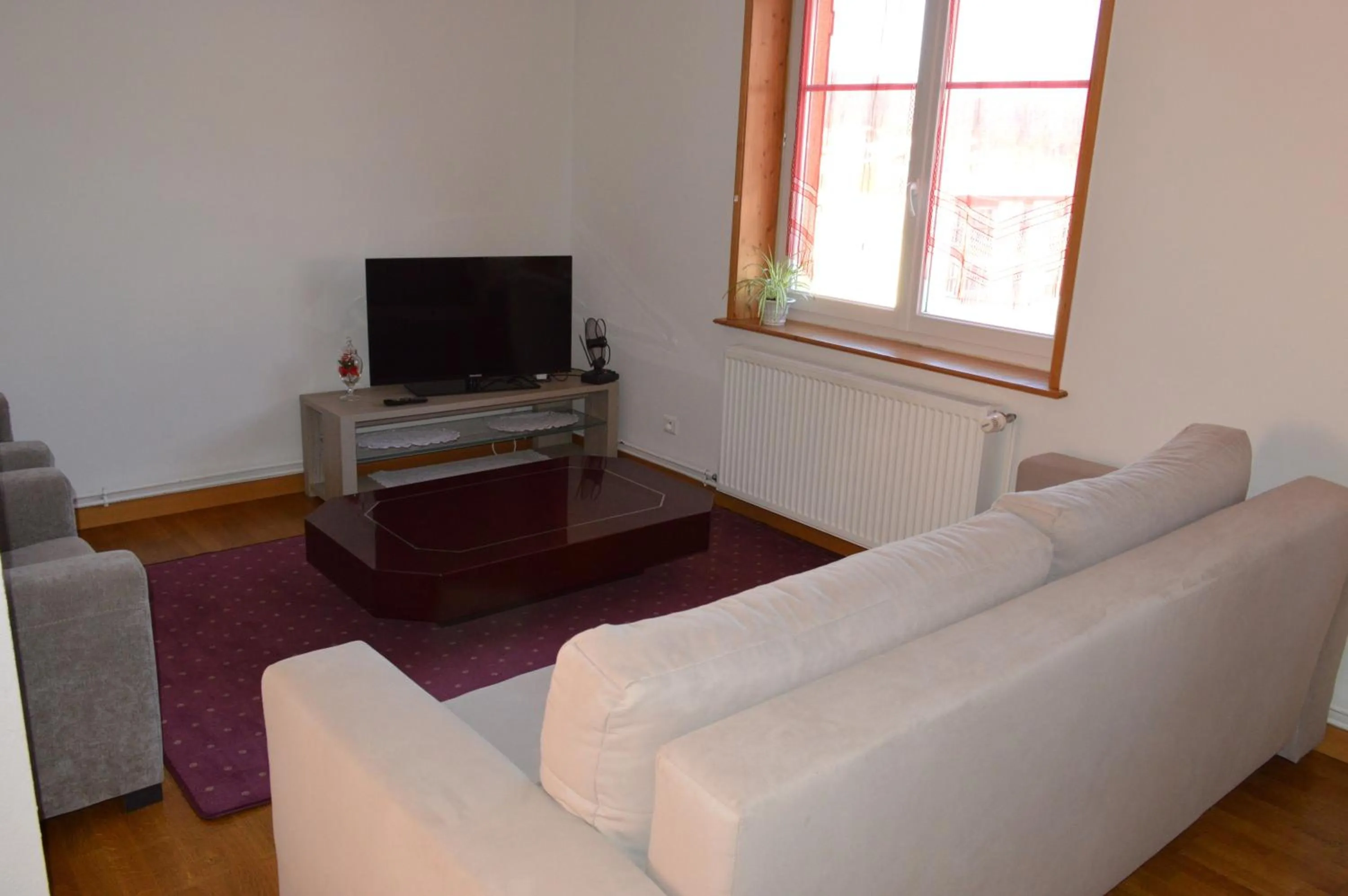 Communal lounge/ TV room in Hôtel Timgad