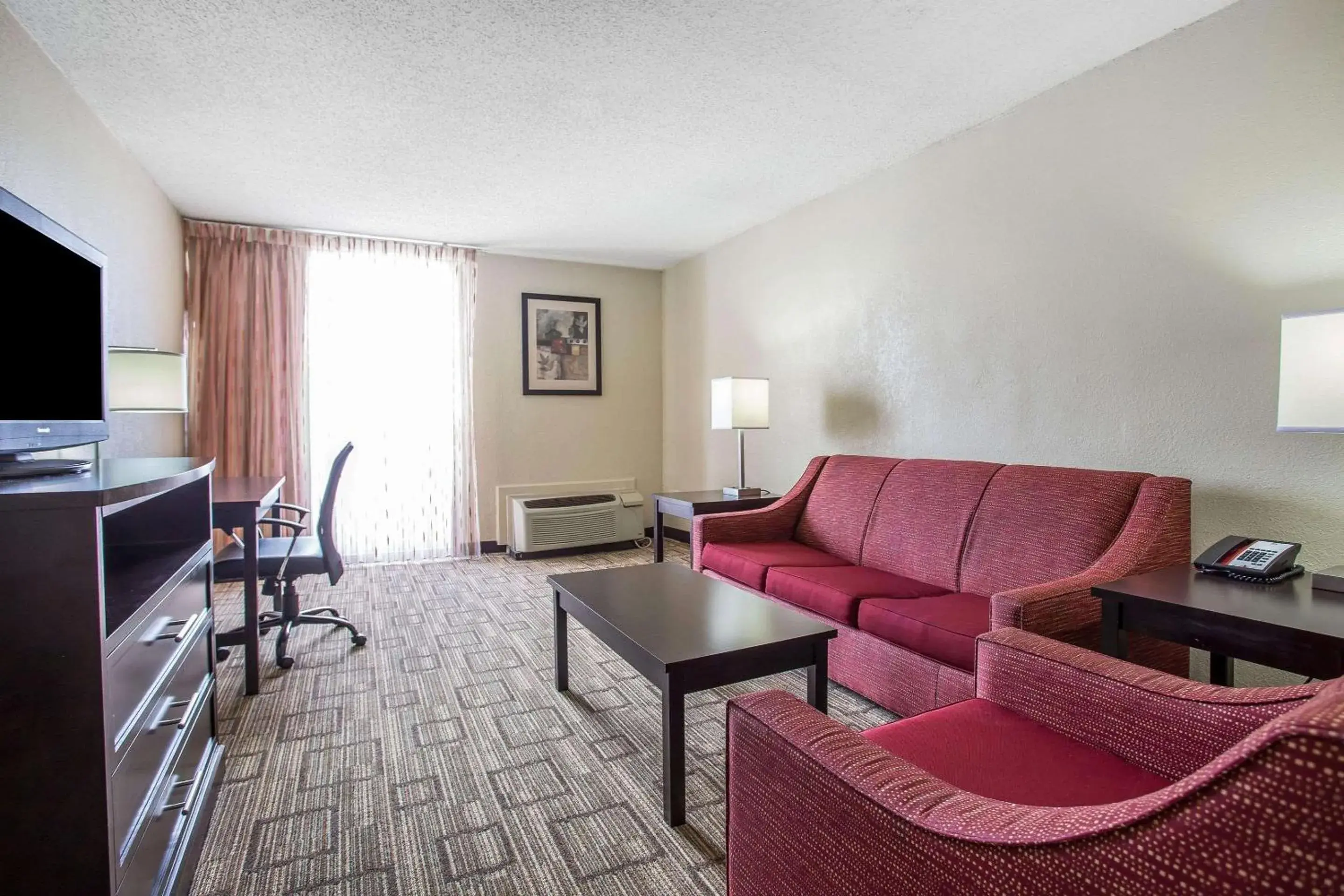 Photo of the whole room, Seating Area in Clarion Hotel Fort Mill Near Amusement Park