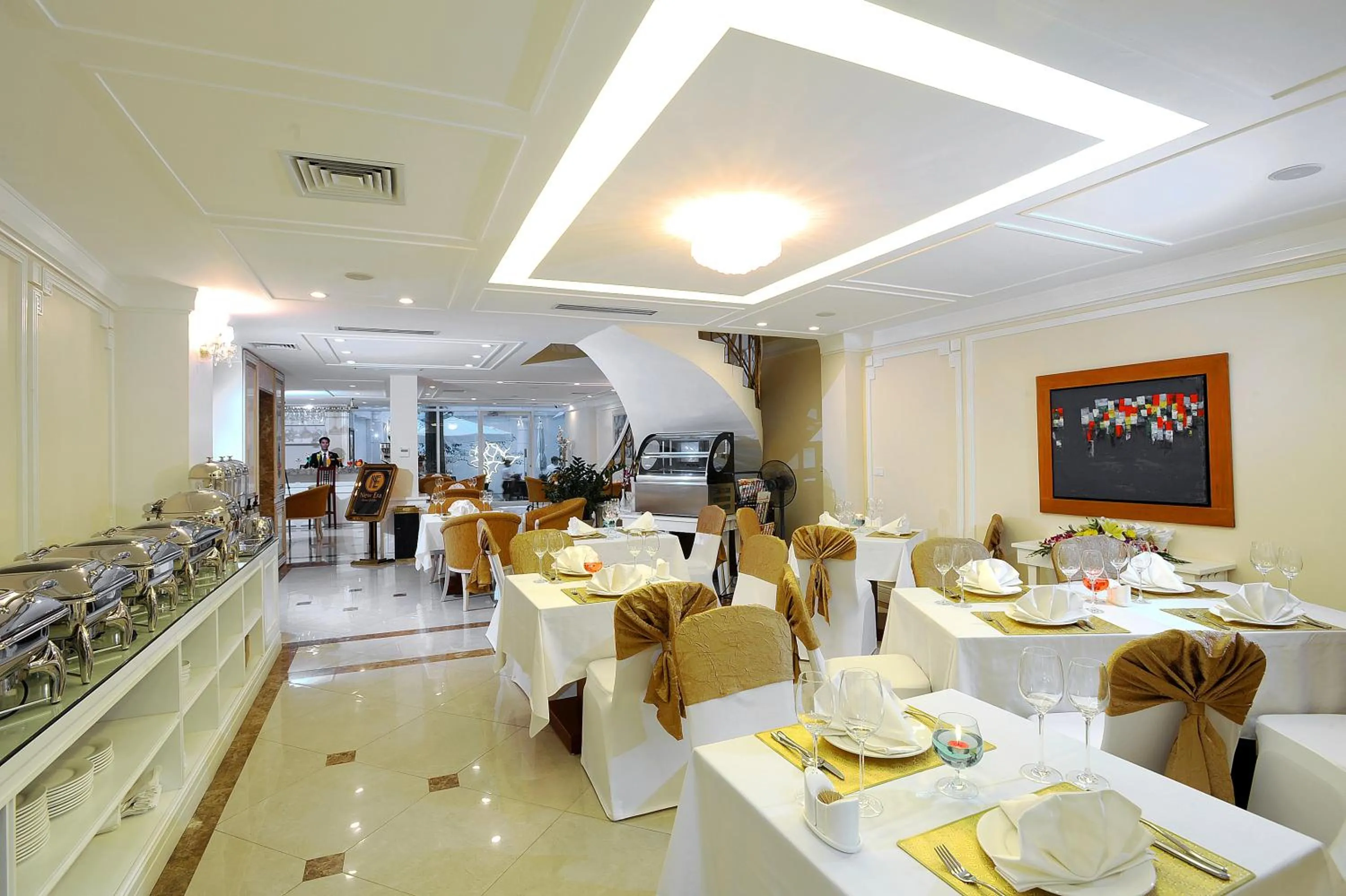 Restaurant/Places to Eat in New Era Hotel & Villa