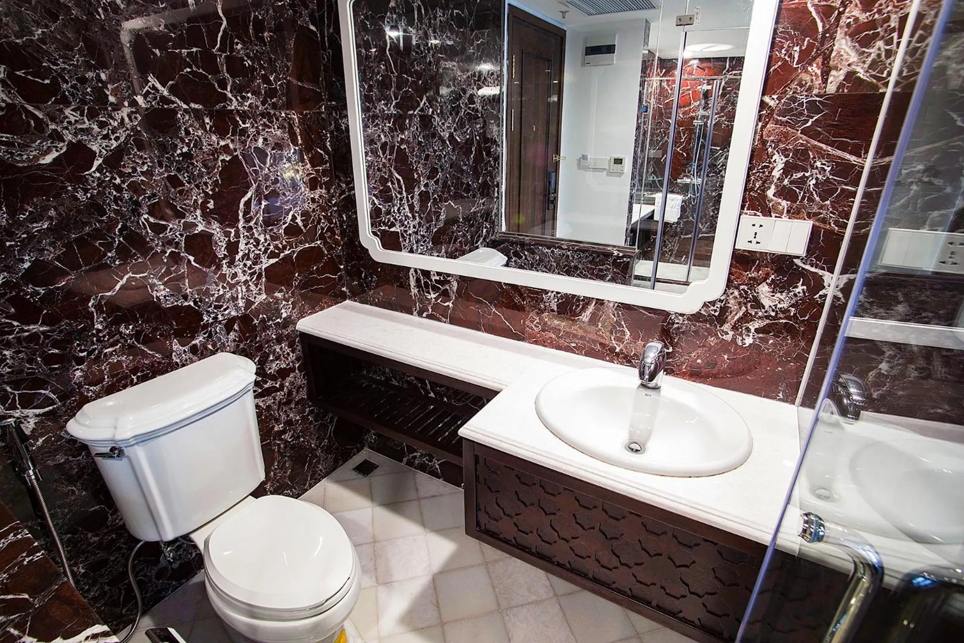 Bathroom in New Era Hotel & Villa