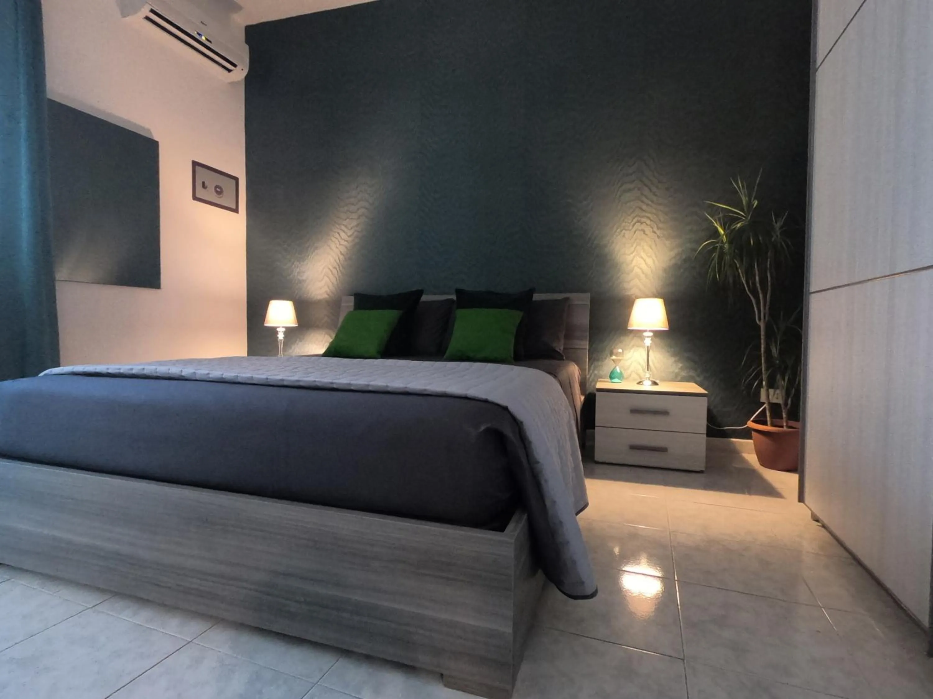 Bed in PINOTTO BNB