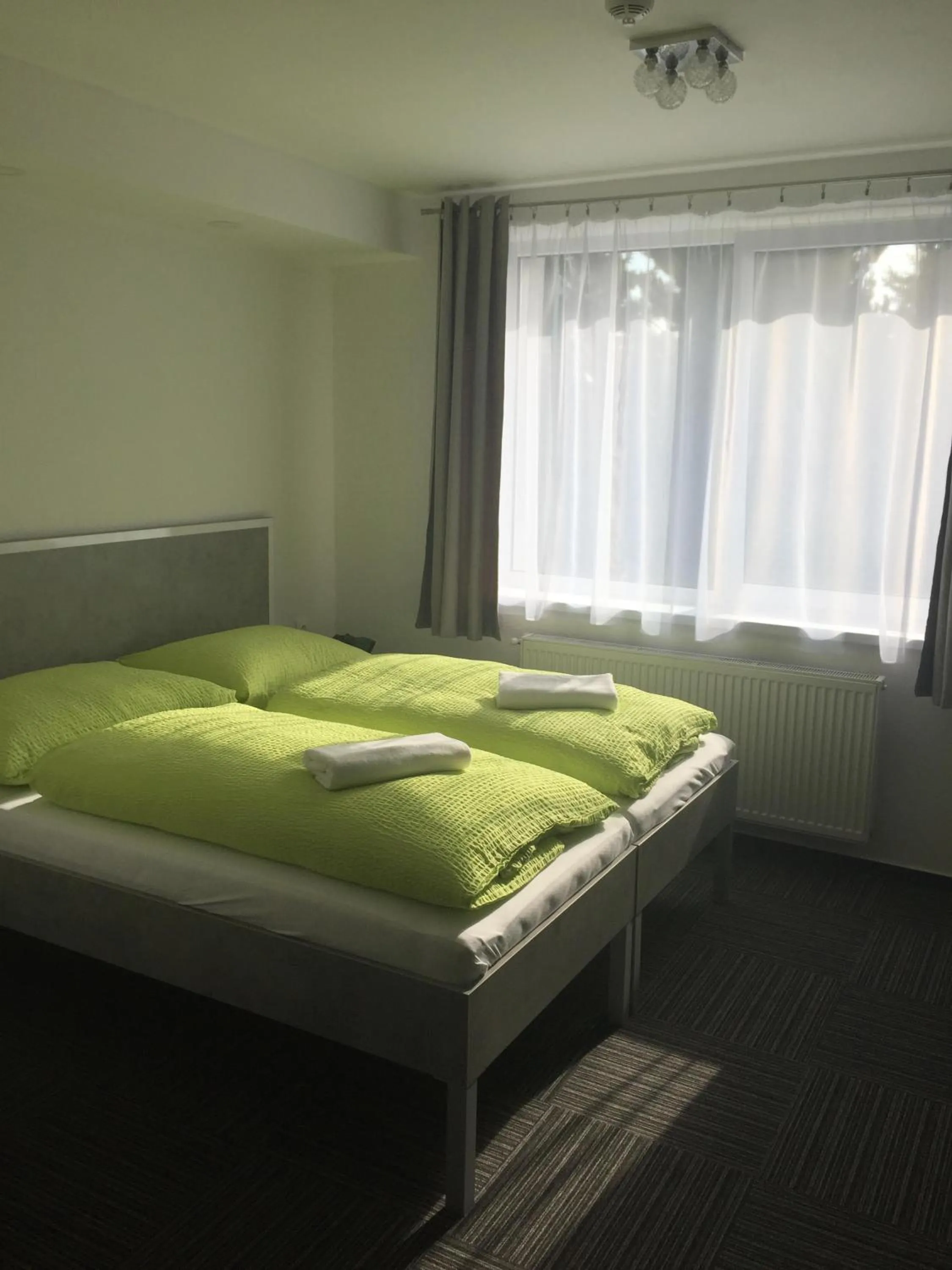 Photo of the whole room, Bed in Garni Hotel 31