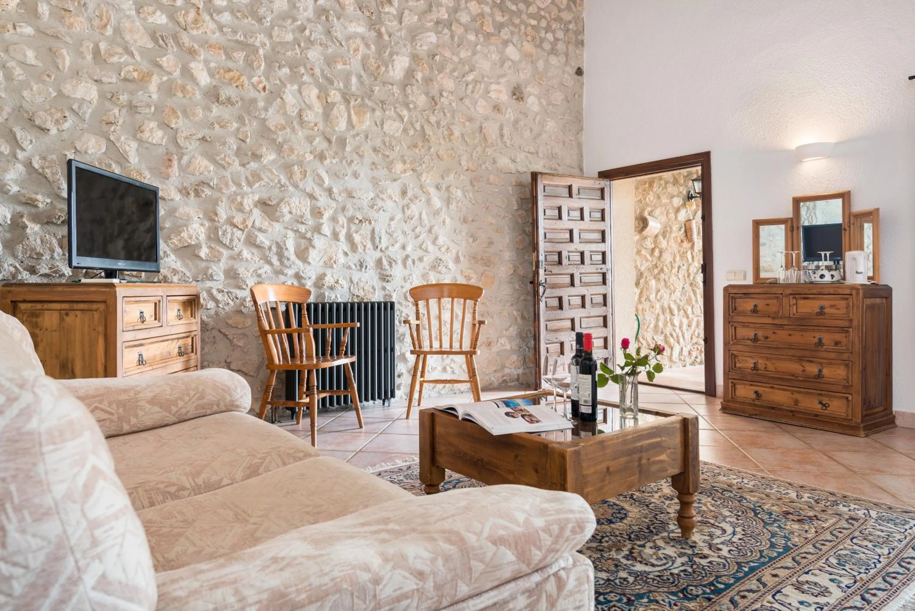 Seating area in New Can Furios Hotel by Can Calco Hotels