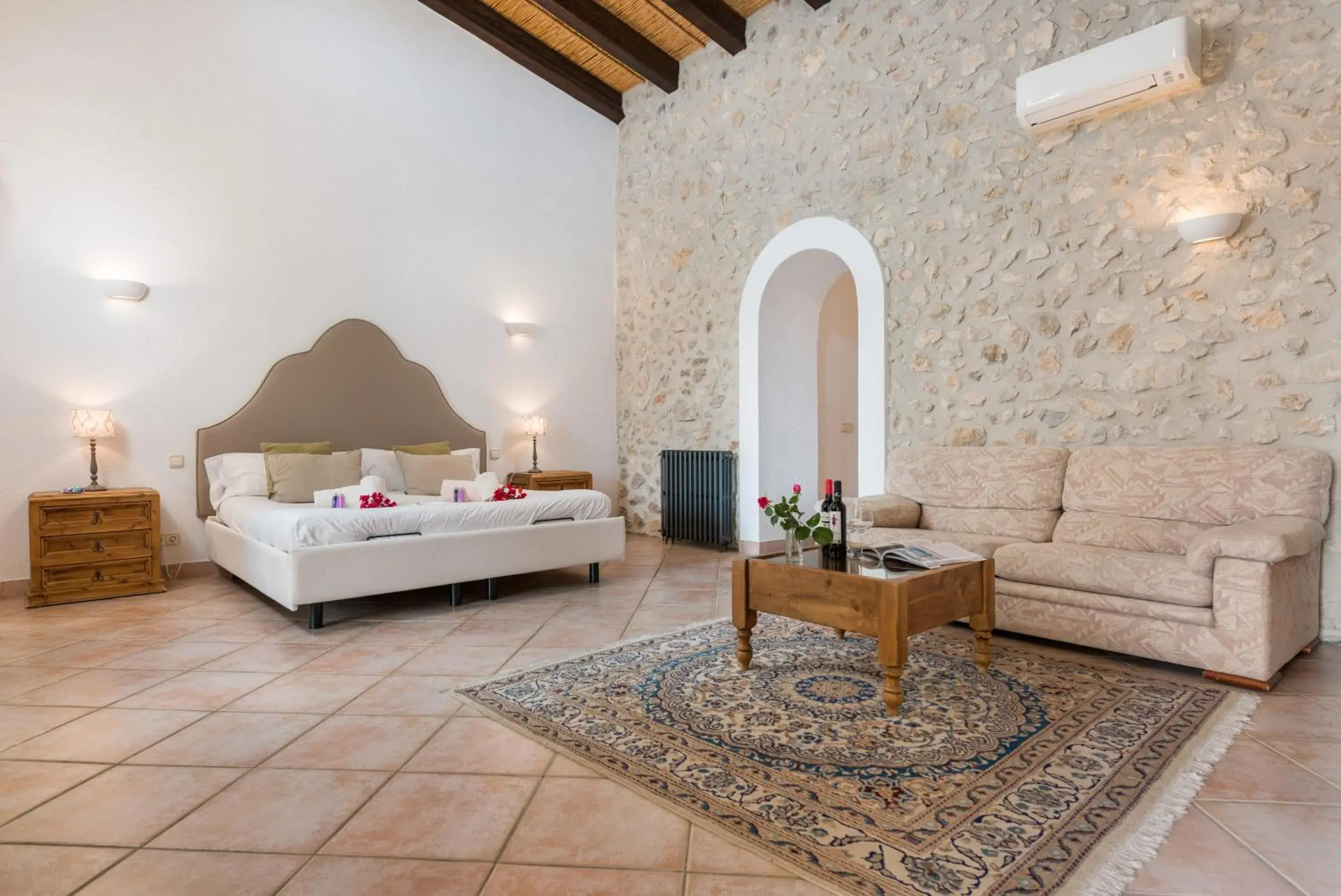 Living room, Bed in New Can Furios Hotel by Can Calco Hotels Living room, Bed in New Can Furios Hotel by Can Calco Hotels