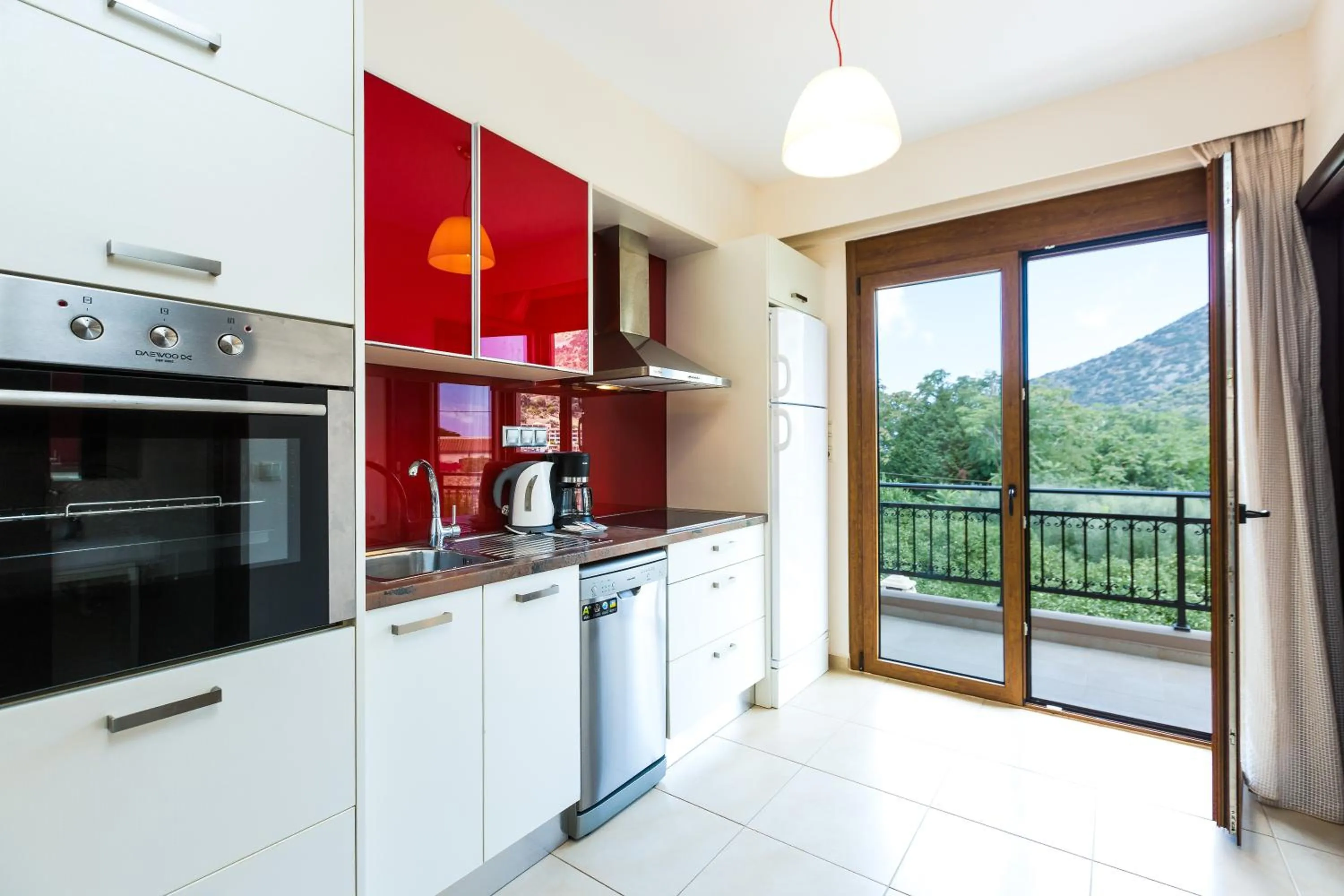 Kitchen or kitchenette in Pantheon Villas & Suites