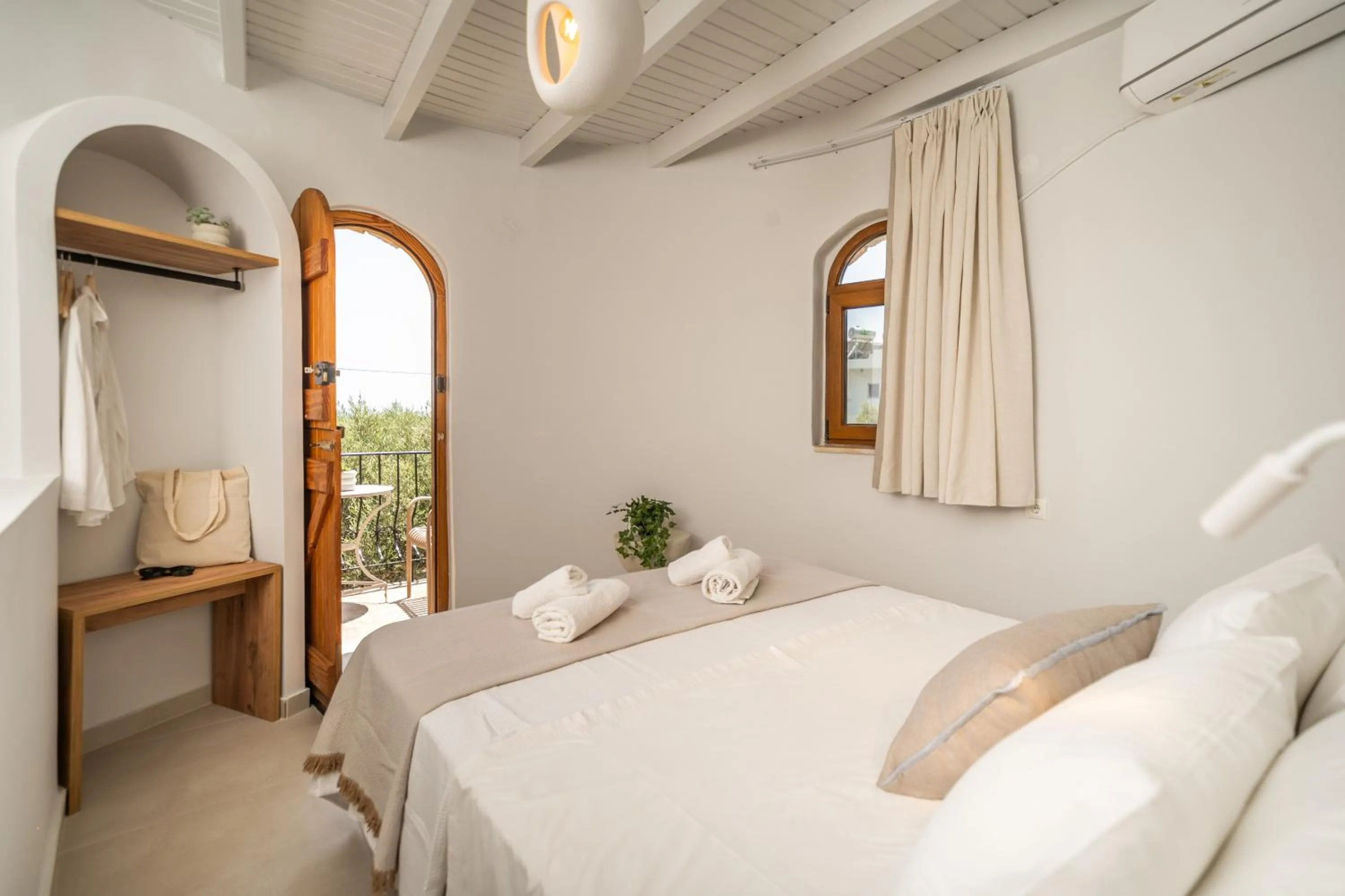 Bed in Fata Morgana Studios & Apartments