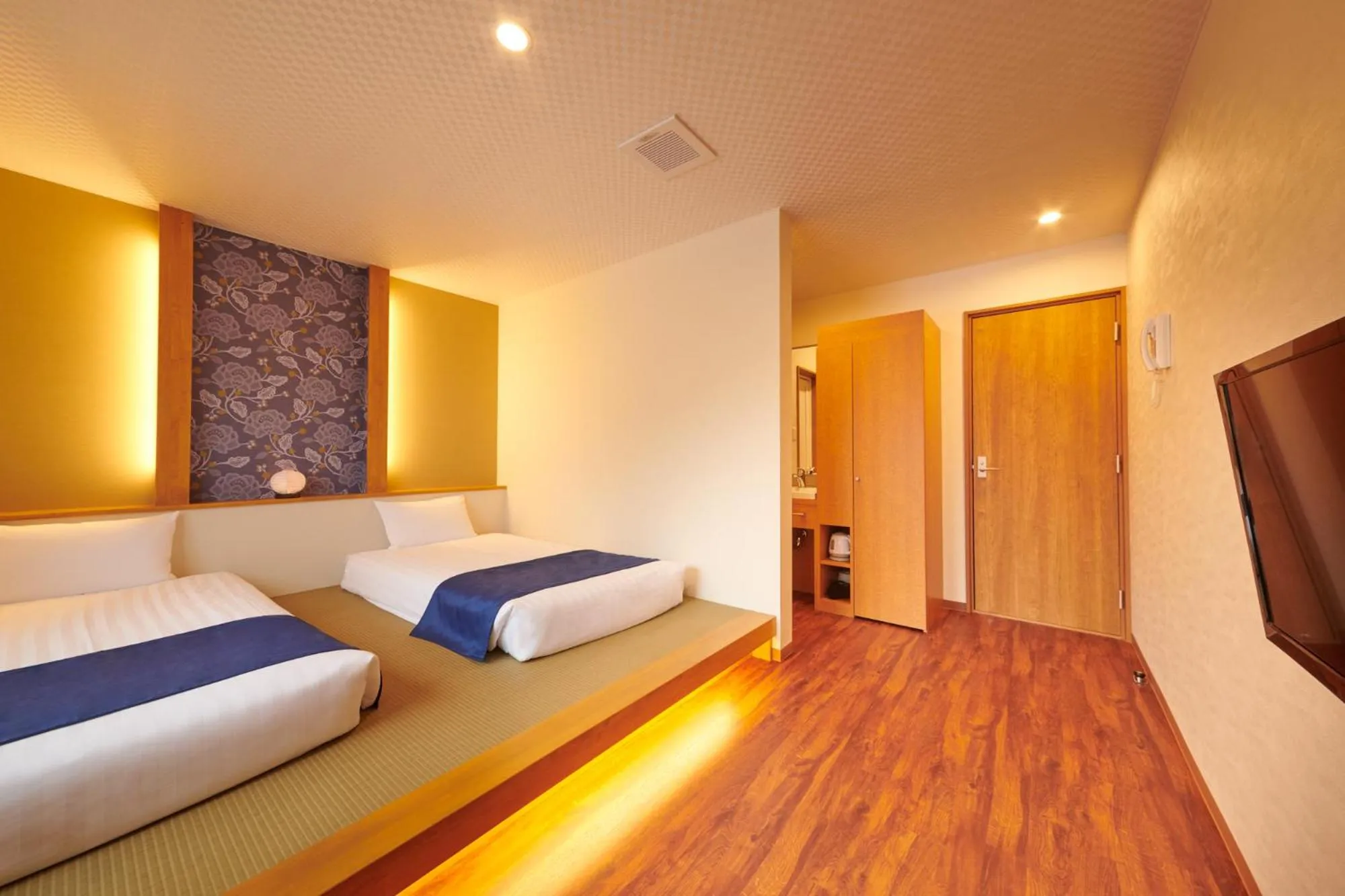 Bed in Ichinomatsu Japanese Modern Hotel