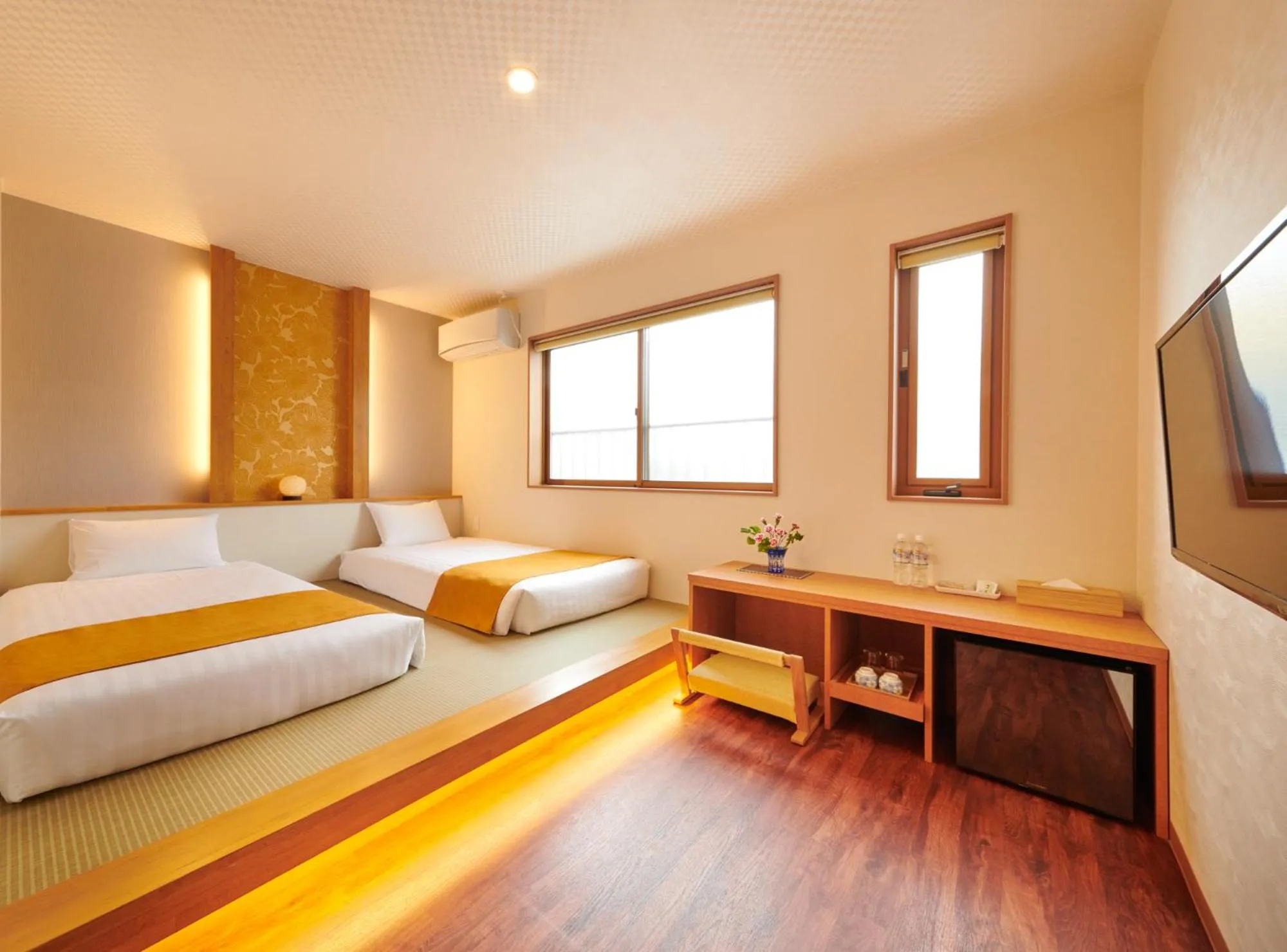 Bed in Ichinomatsu Japanese Modern Hotel