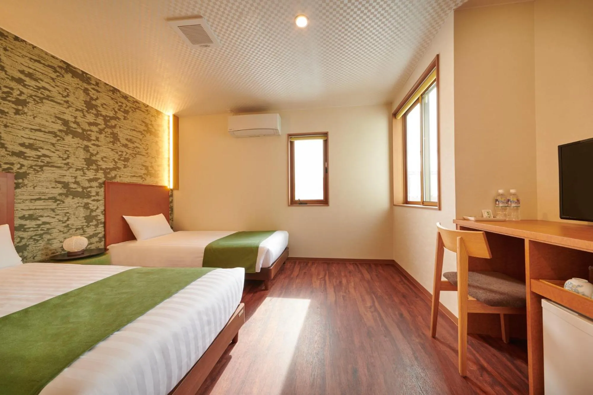 Bed in Ichinomatsu Japanese Modern Hotel