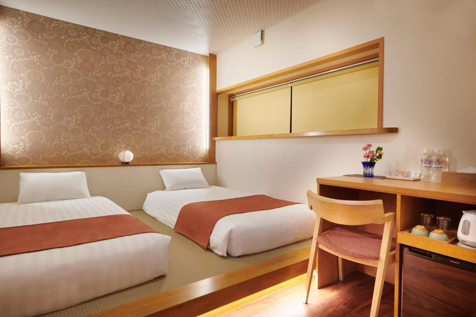 Bed in Ichinomatsu Japanese Modern Hotel