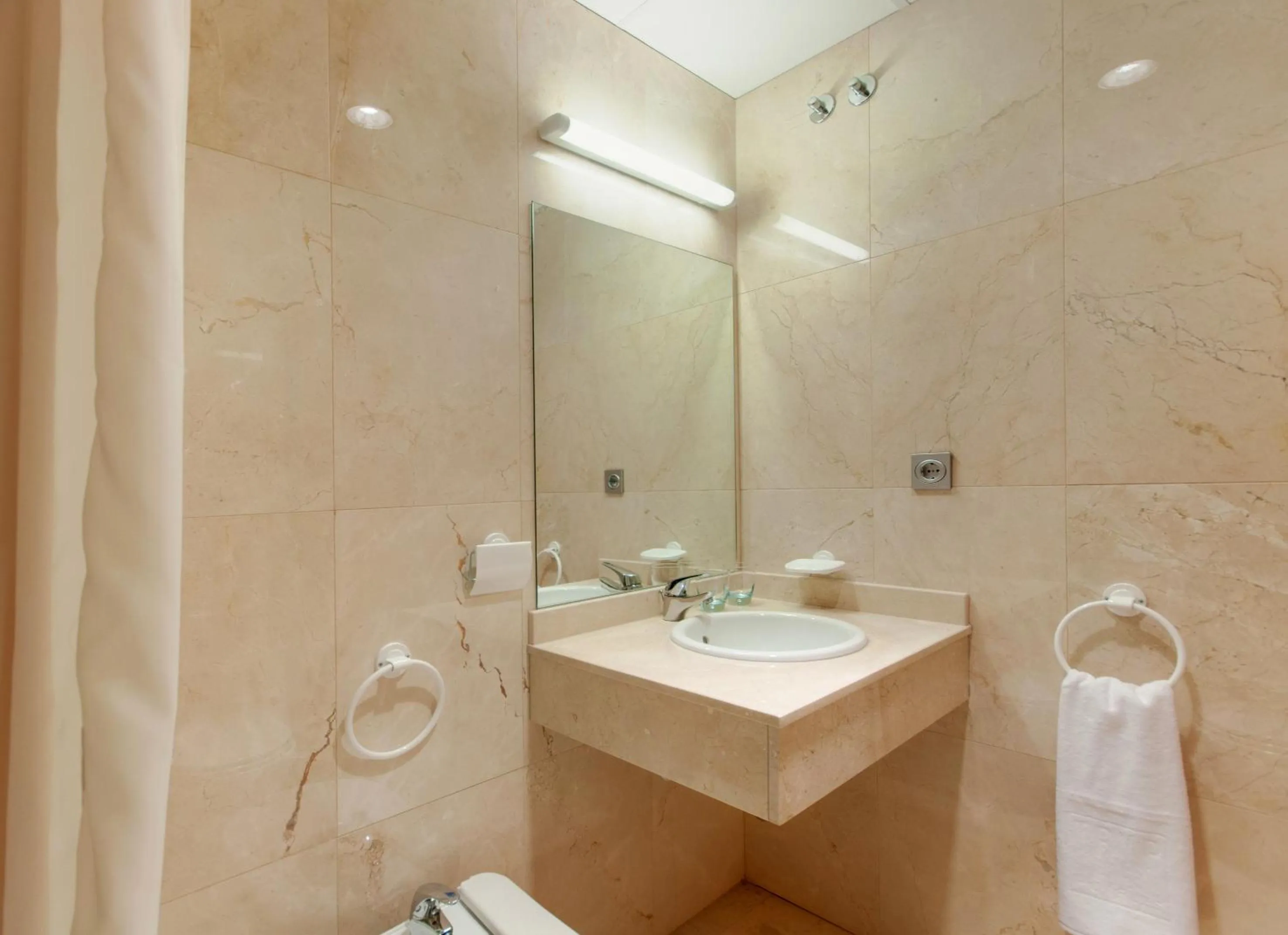 Bathroom in Madrid Airport Suites, Affiliated by Meliá