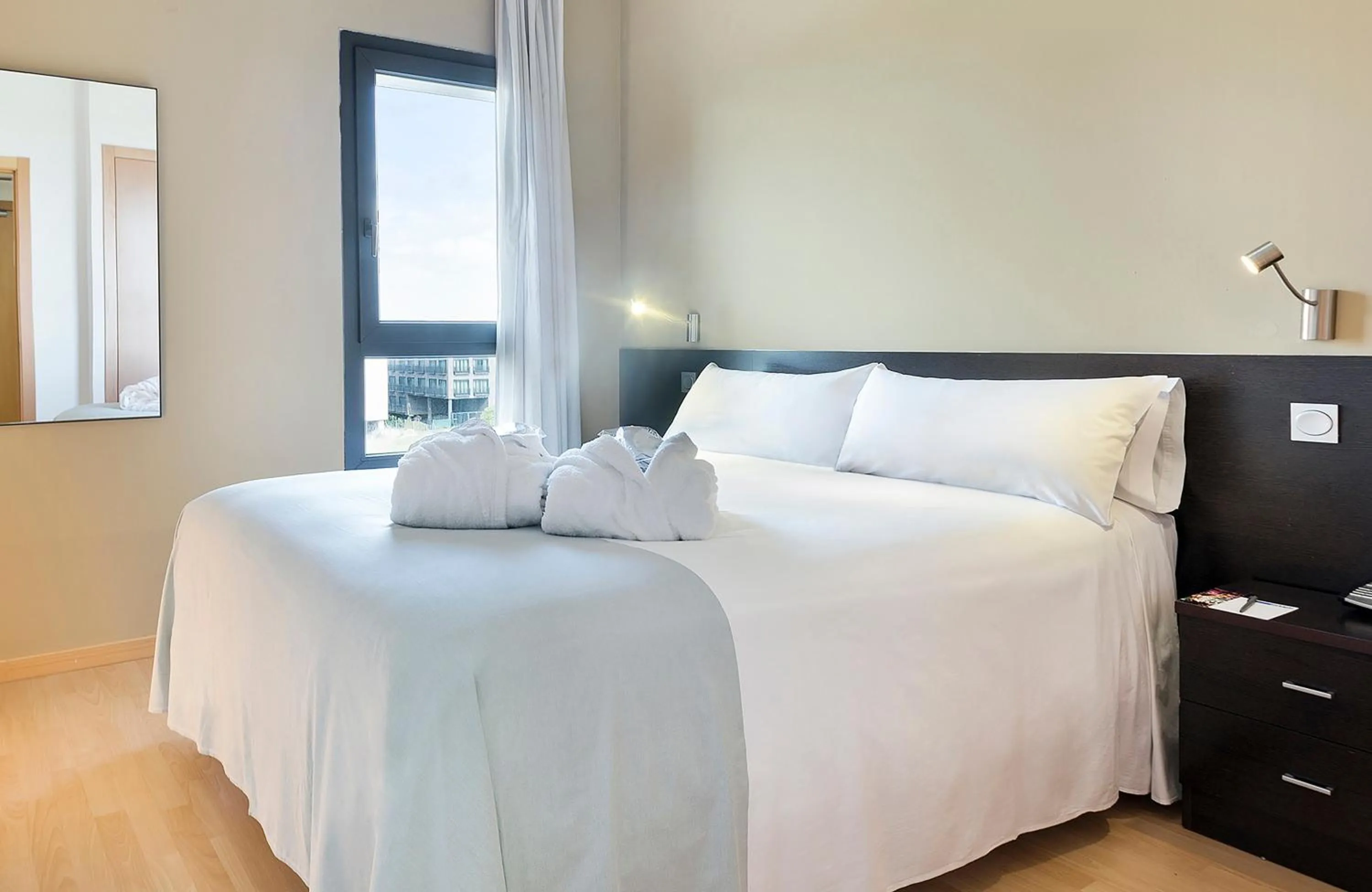 Bed in Madrid Airport Suites, Affiliated by Meliá