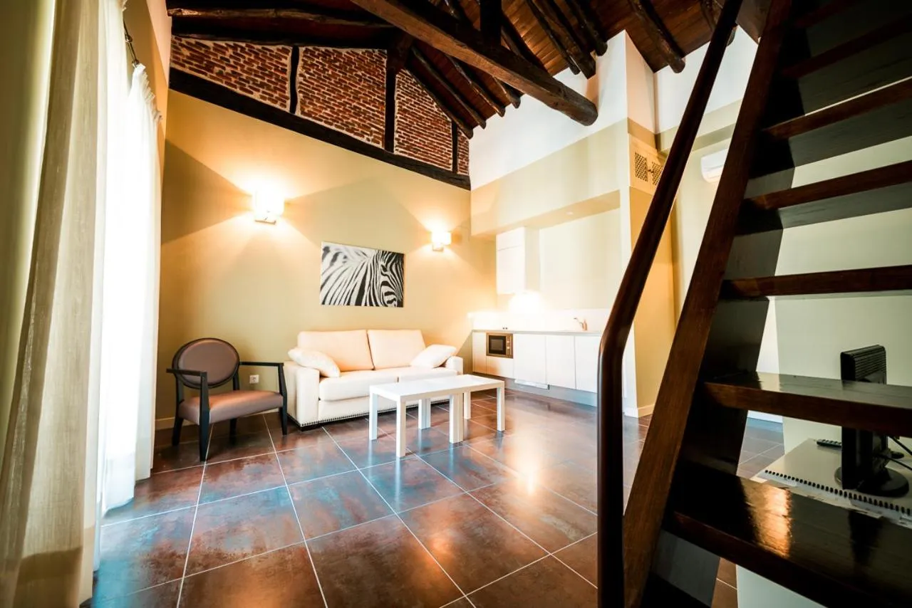 Seating area, Bed in Hacienda la Coracera