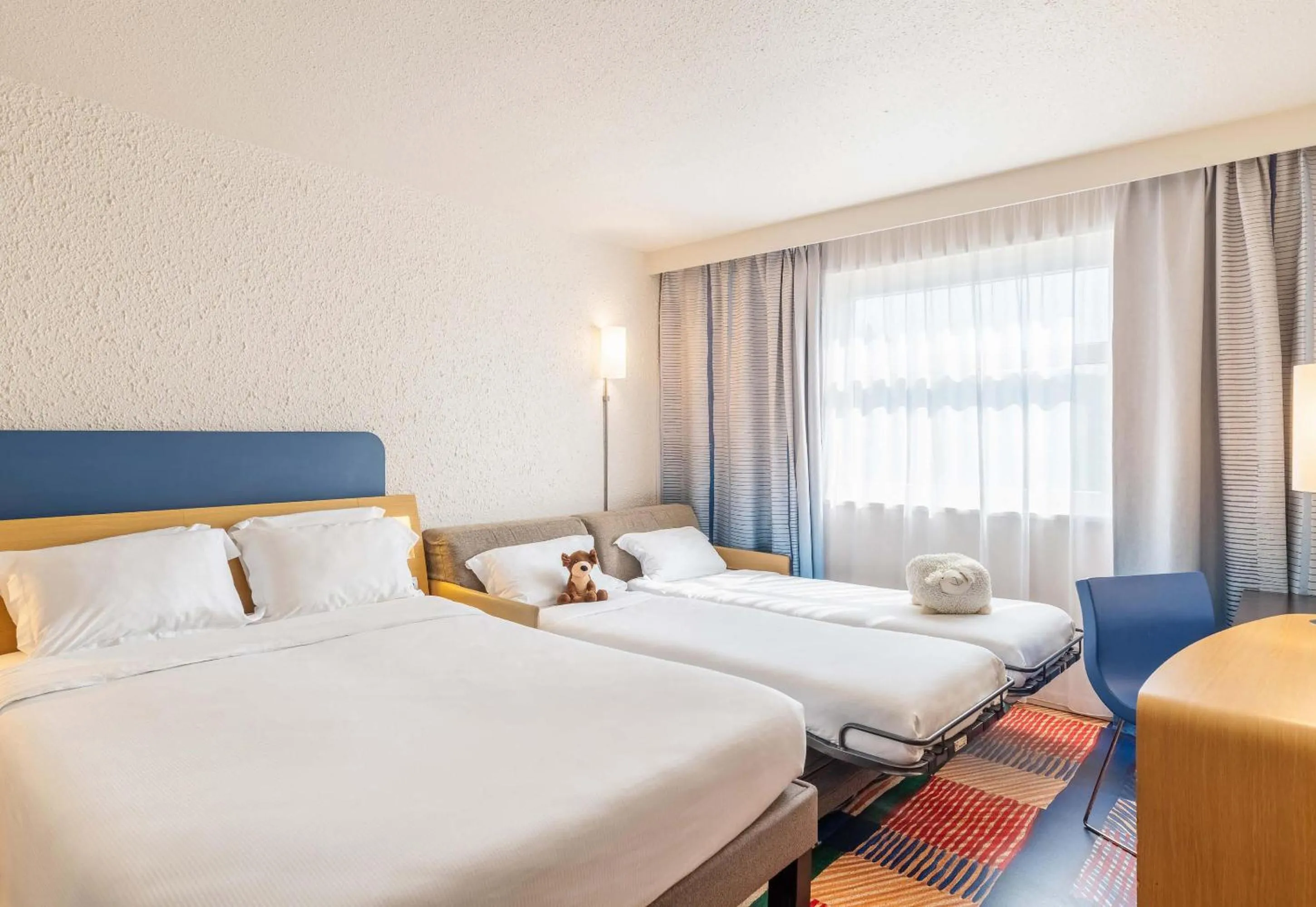 Photo of the whole room, Bed in B&B HOTEL Lyon Nord 4 étoiles