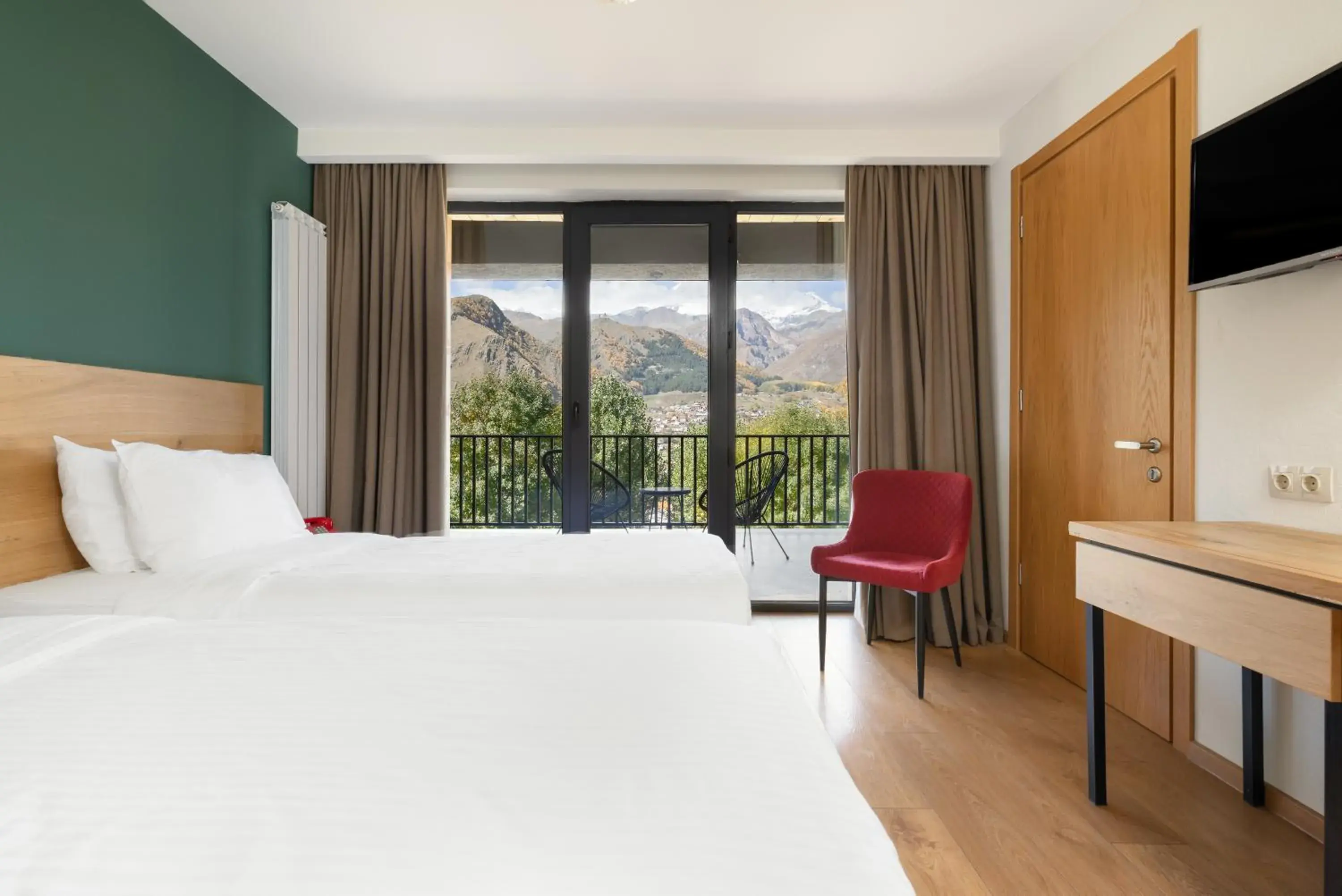 Family Room with Front View and Terrace in Intourist Kazbegi Family Room with Front View and Terrace in Intourist Kazbegi