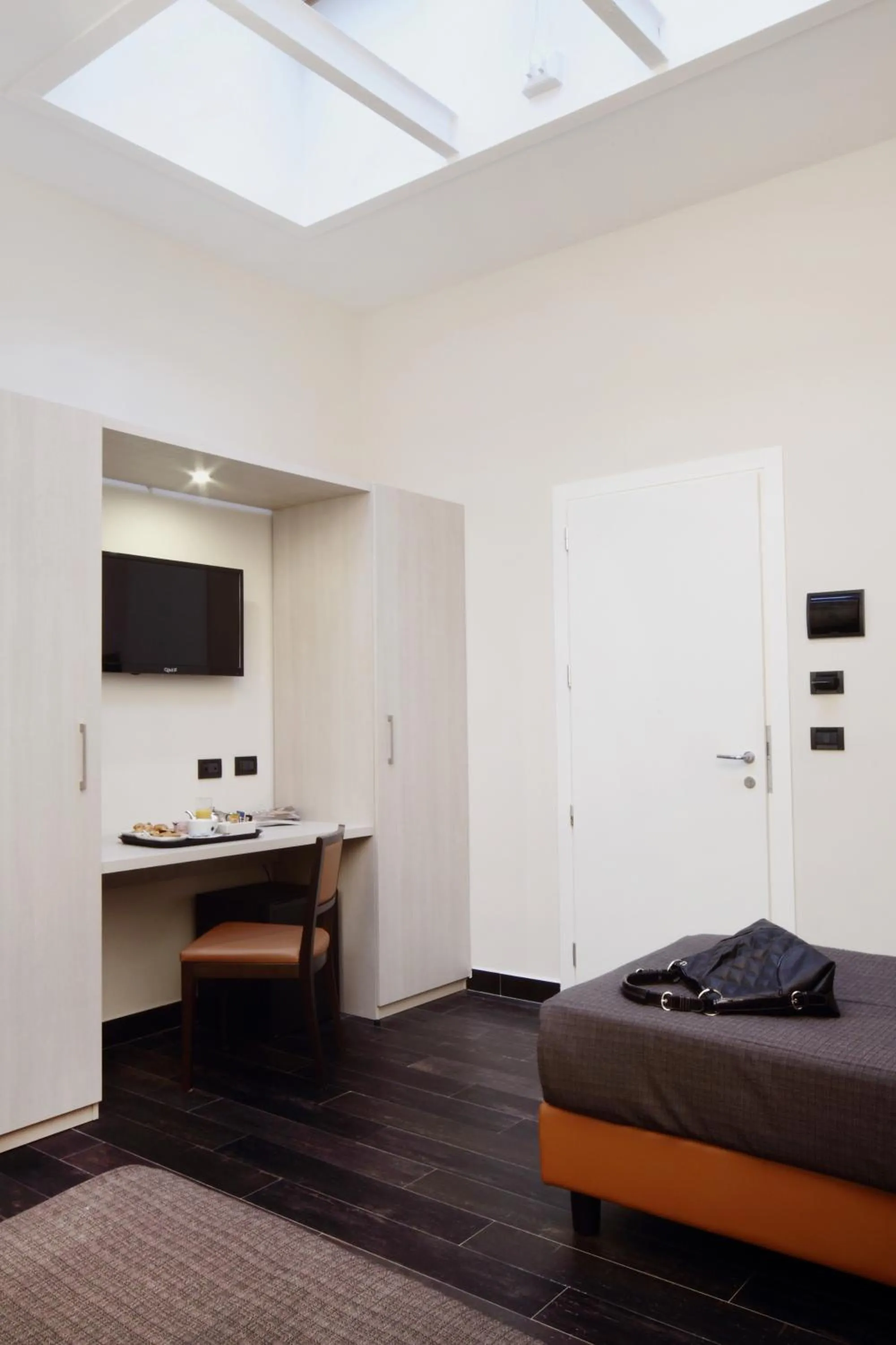 Seating area, Bed in Borgo Pio Suites Inn