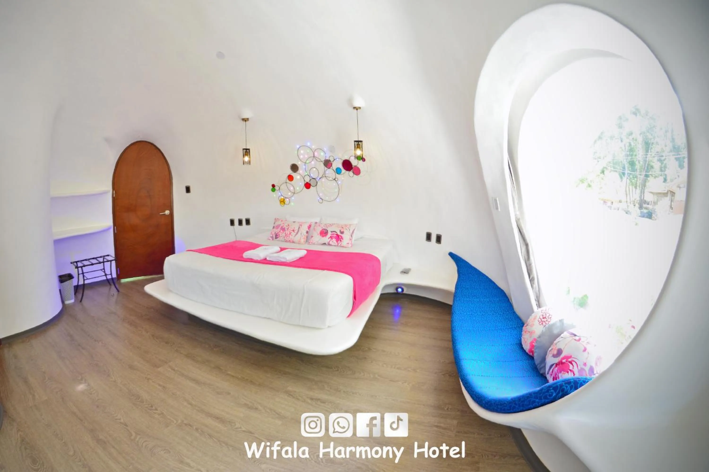 Bed in Wifala Harmony Hotel