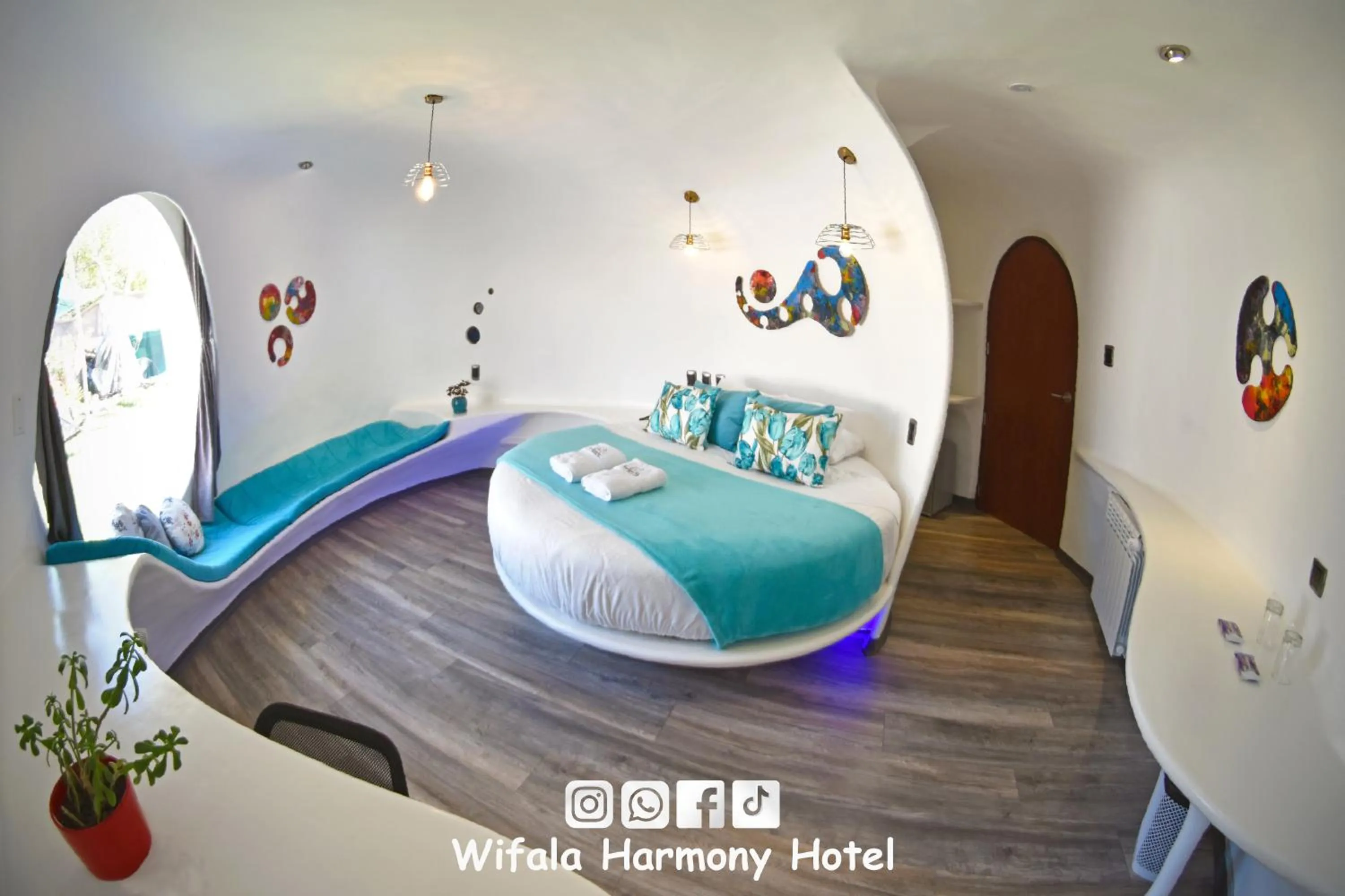 Bed in Wifala Harmony Hotel