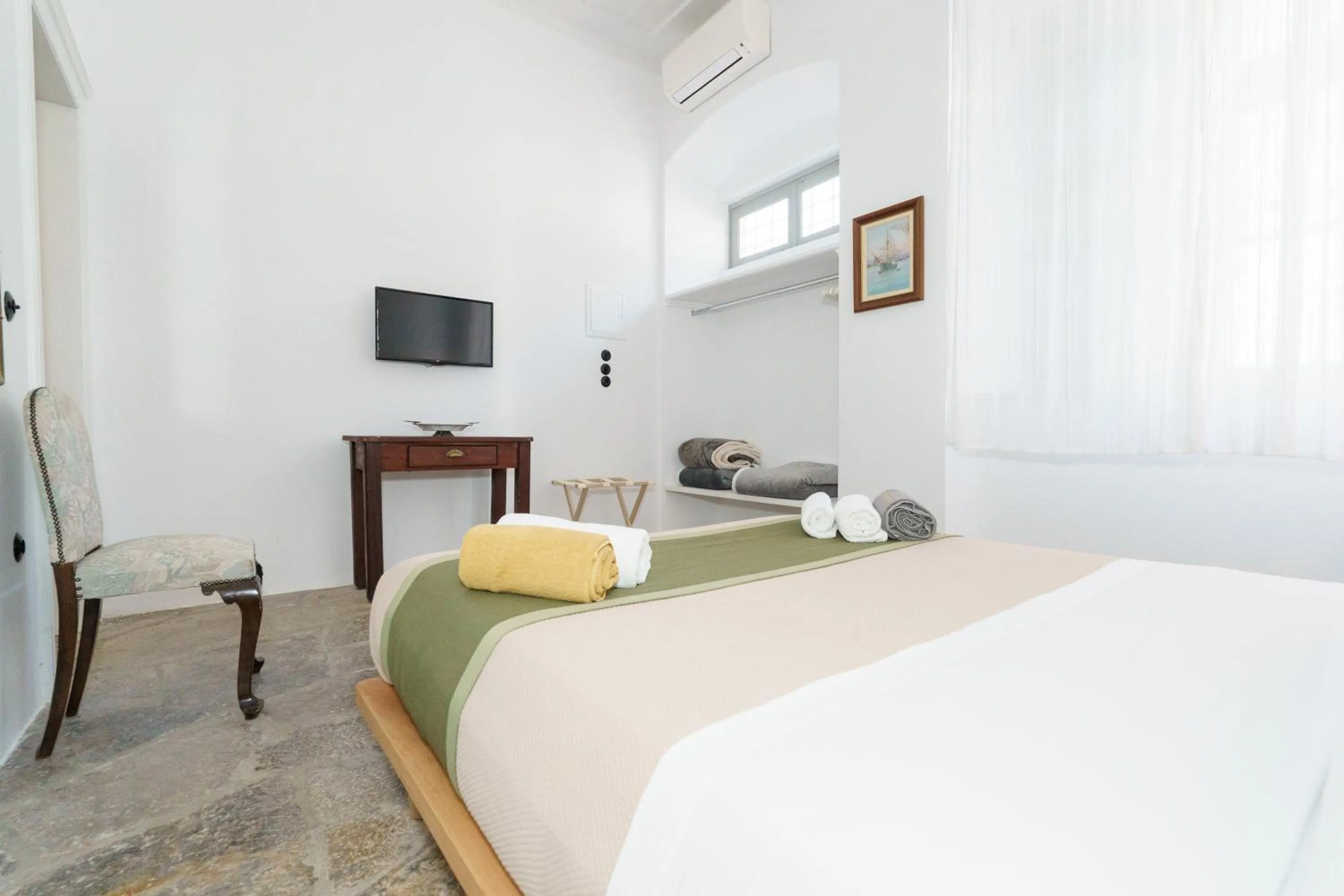 Bed in LIVIN Hydra Garden Suite