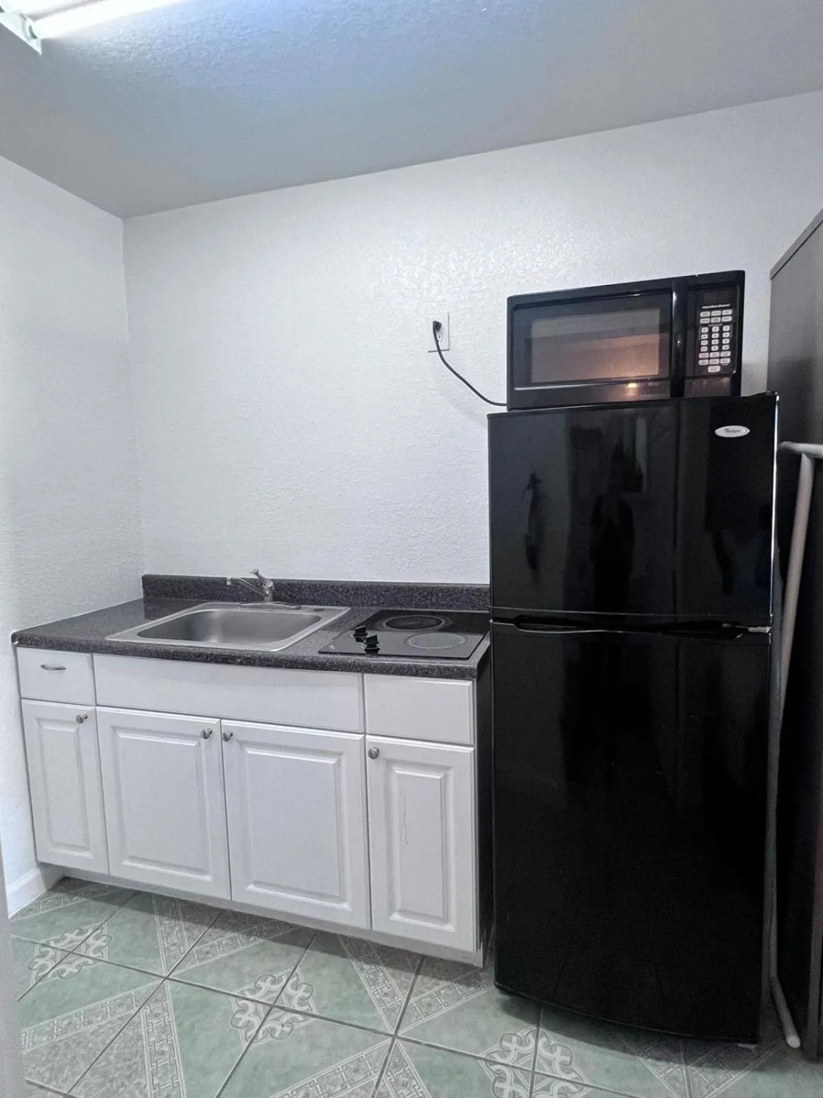 Bedroom in OYO Garden Inn and Suites Pearsall I-35 East