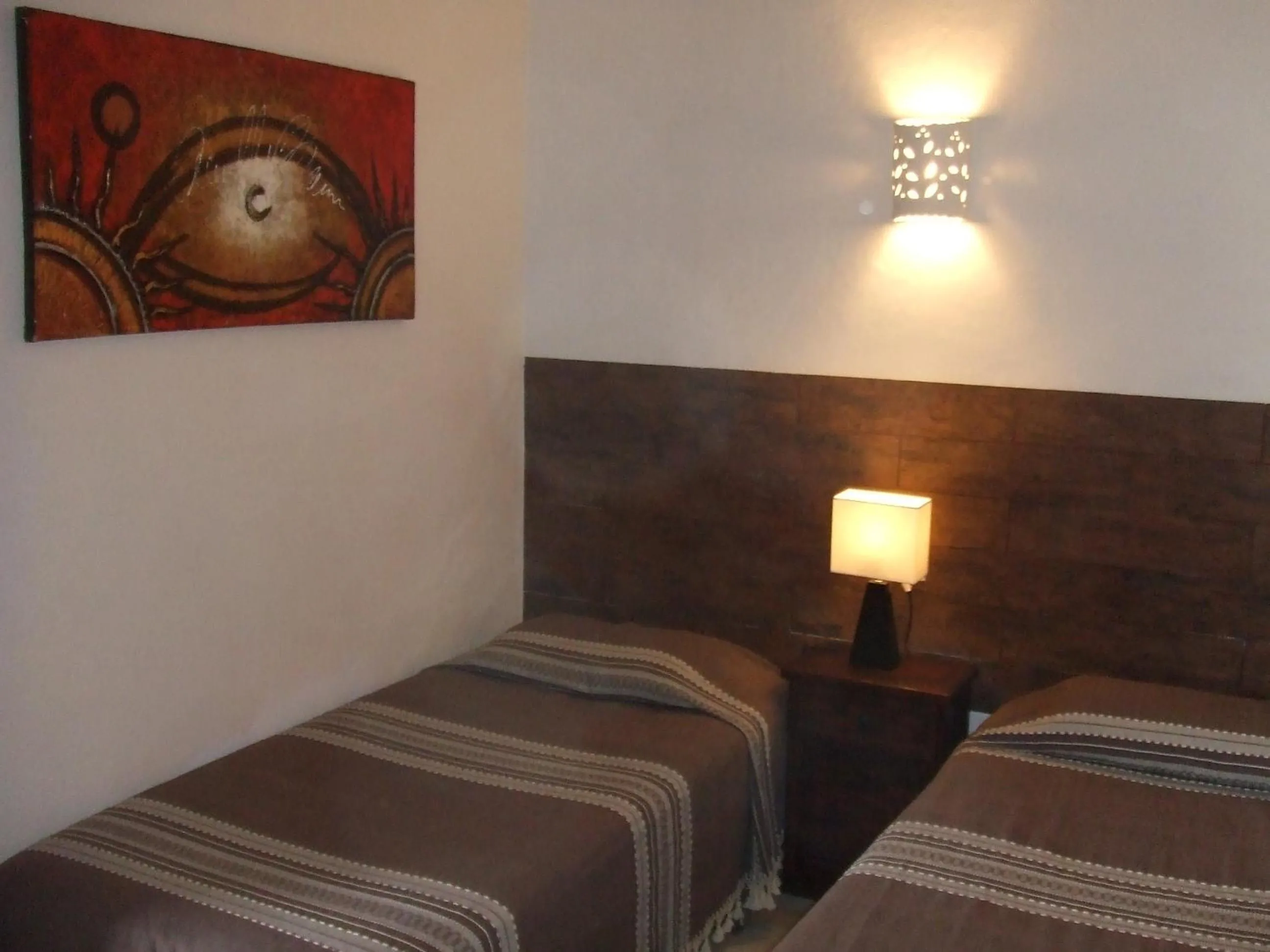 Bed in Aventura Pacifico Boutique Suites & Villas