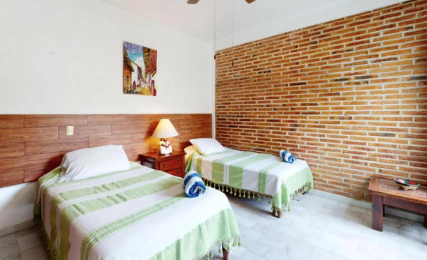 Bed in Aventura Pacifico Boutique Suites & Villas