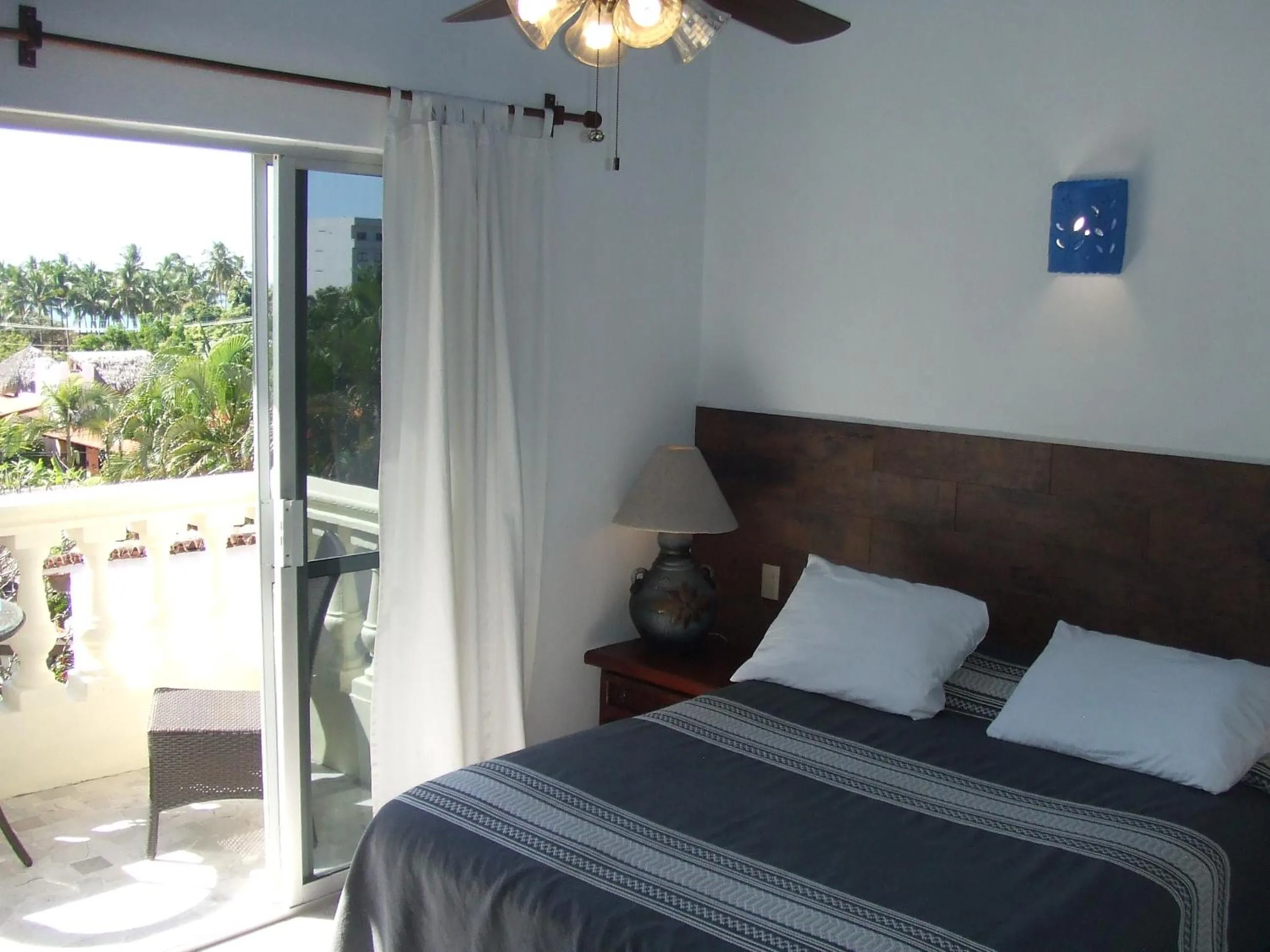 Bed in Aventura Pacifico Boutique Suites & Villas
