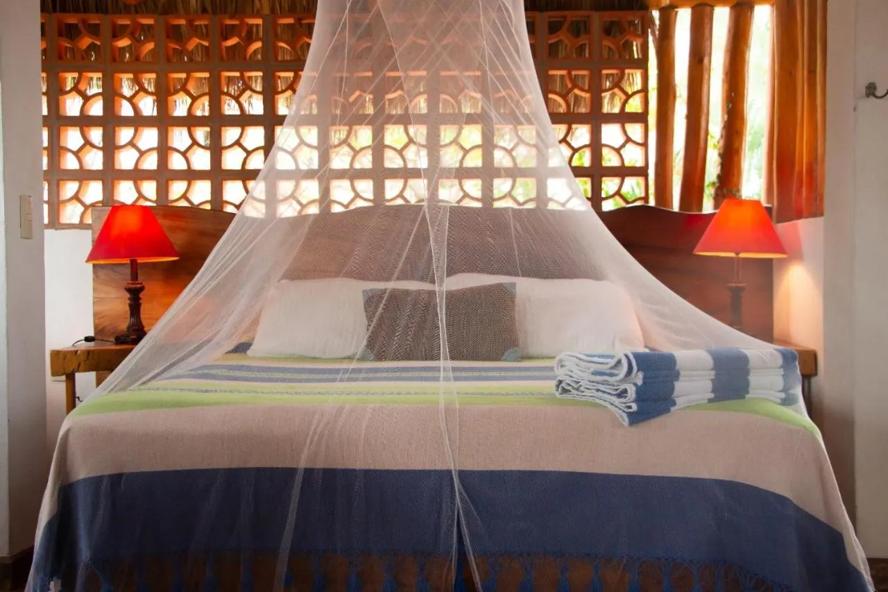 Bed in Aventura Pacifico Boutique Suites & Villas