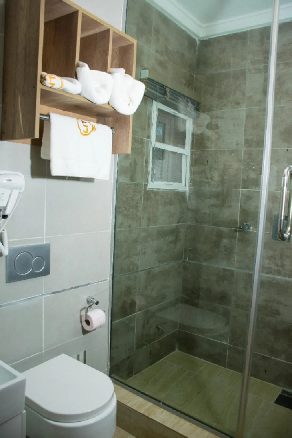 Property logo or sign in Lit Suites