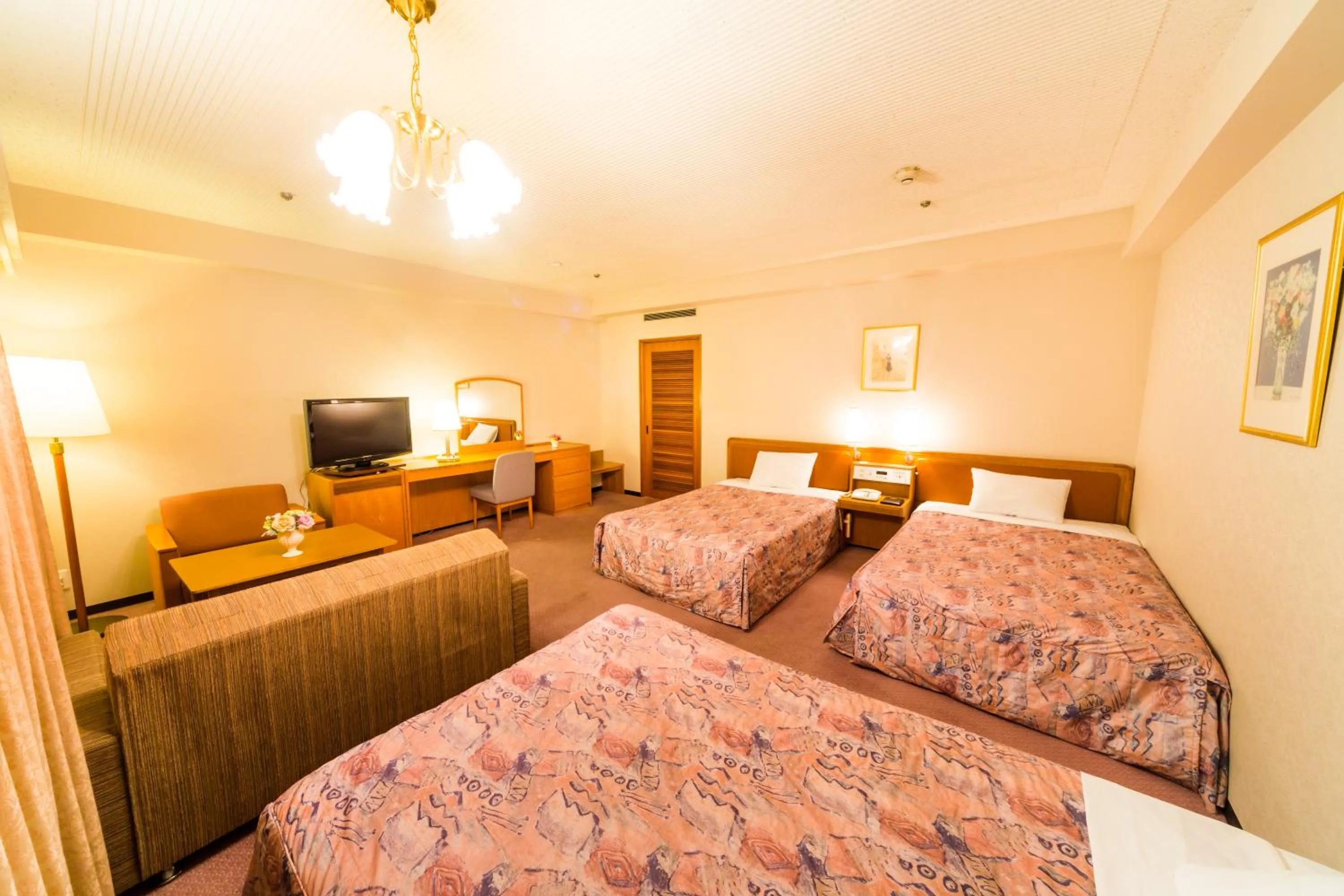 Photo of the whole room, Bed in The Crown Palais New Hankyu Kochi