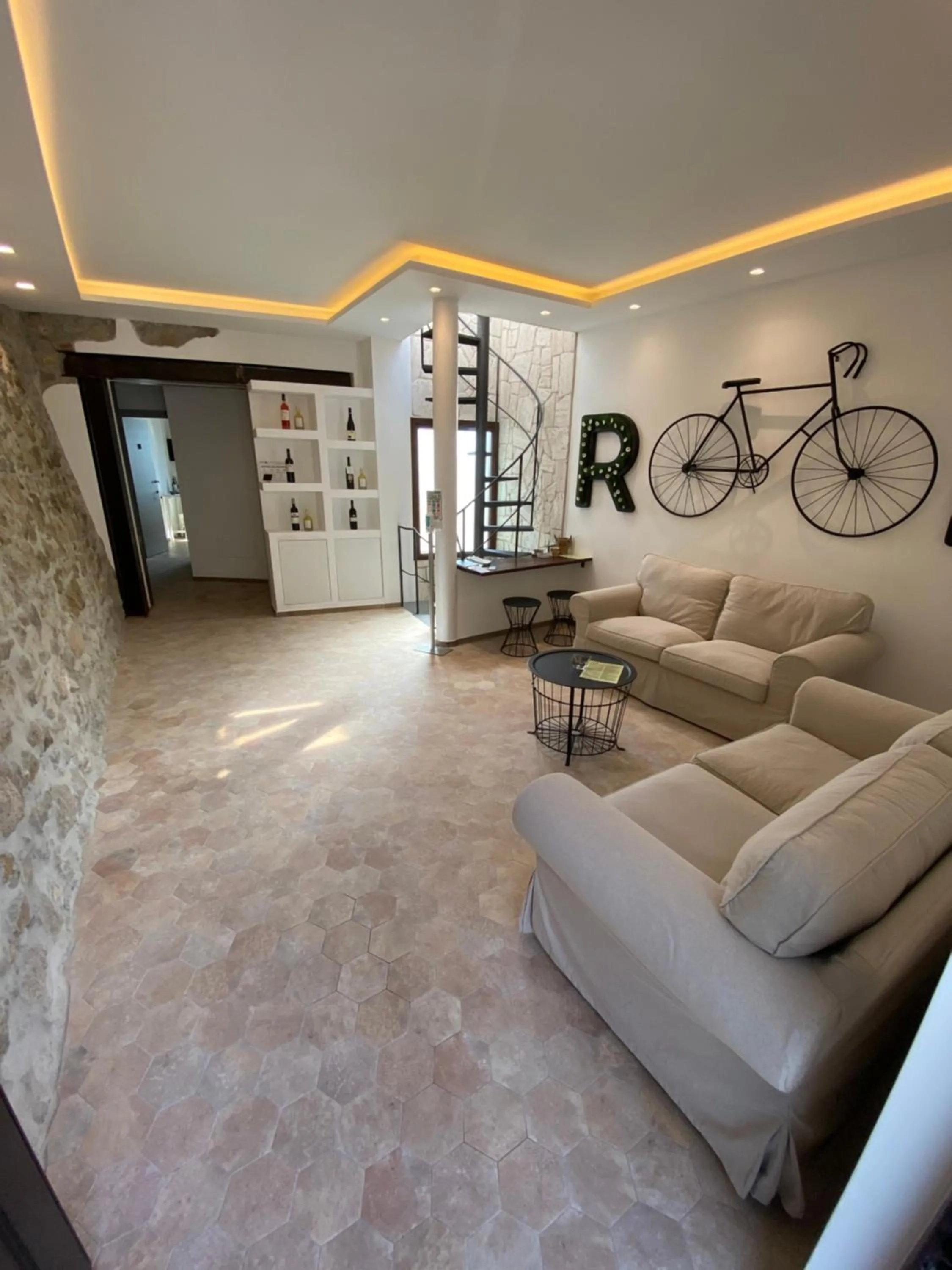 Communal lounge/ TV room in L'Orologio Bed & Breakfast