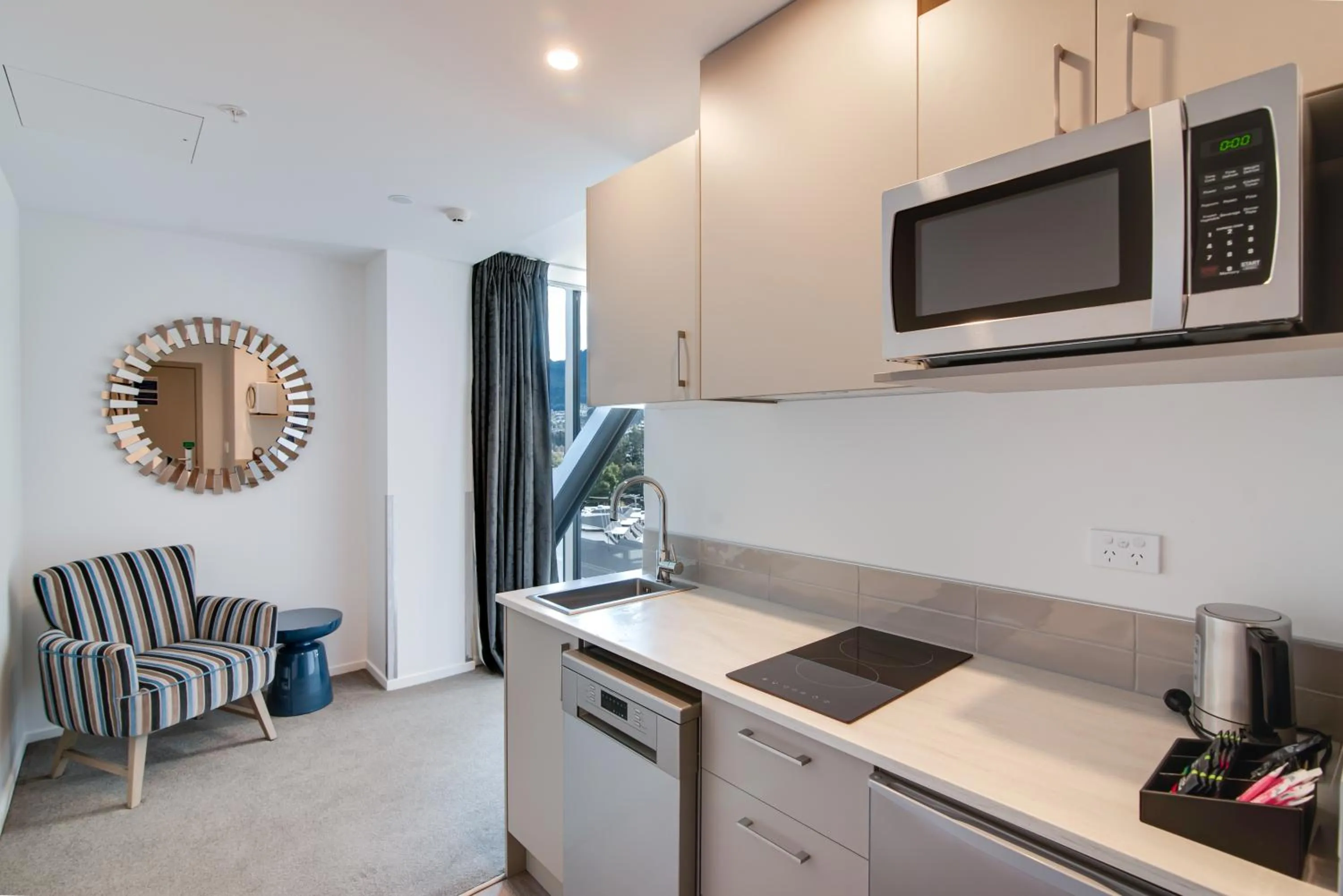 Kitchen or kitchenette in Ramada by Wyndham Queenstown Central