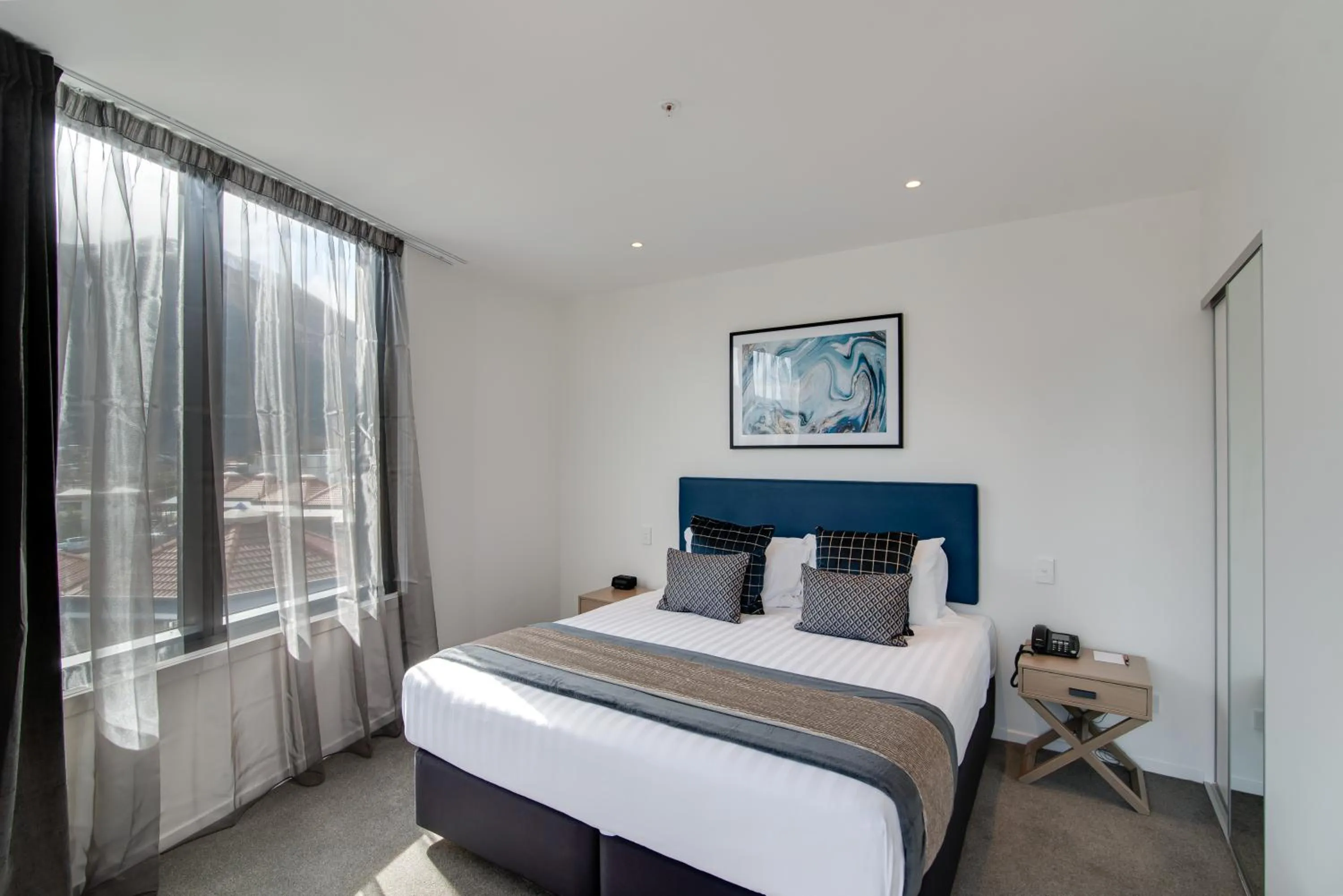 Bed in Ramada by Wyndham Queenstown Central